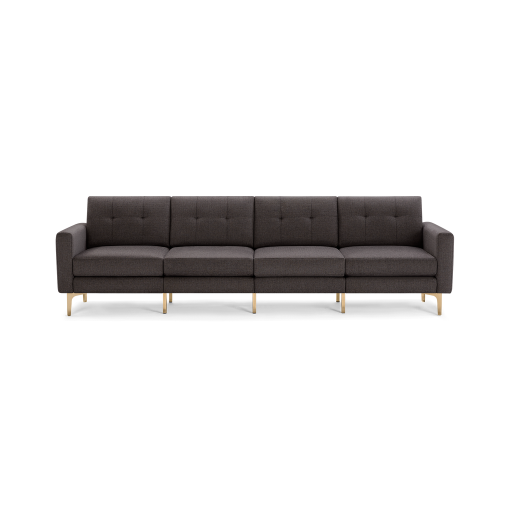 Modern dark gray fabric sofa with tufted back cushions, straight arms, and slim gold metal legs, seating four people.