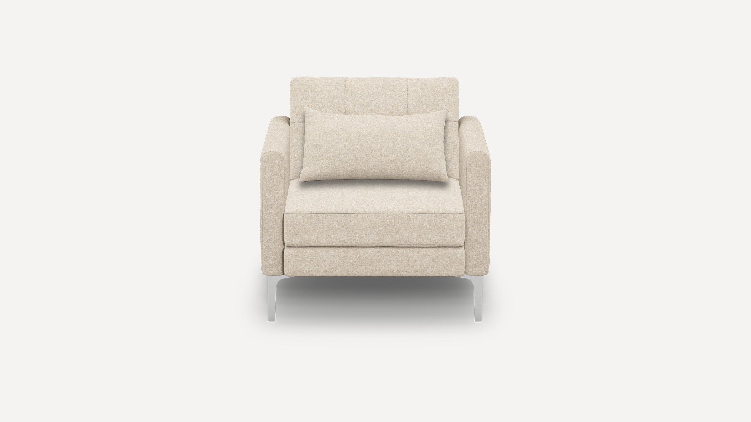 Front view of a modern beige fabric armchair with a rectangular lumbar pillow and sleek metal legs on a white background.