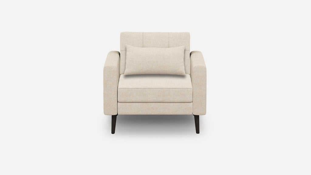 Beige upholstered armchair with rectangular back cushion, straight armrests, and dark wooden legs, shown from front.