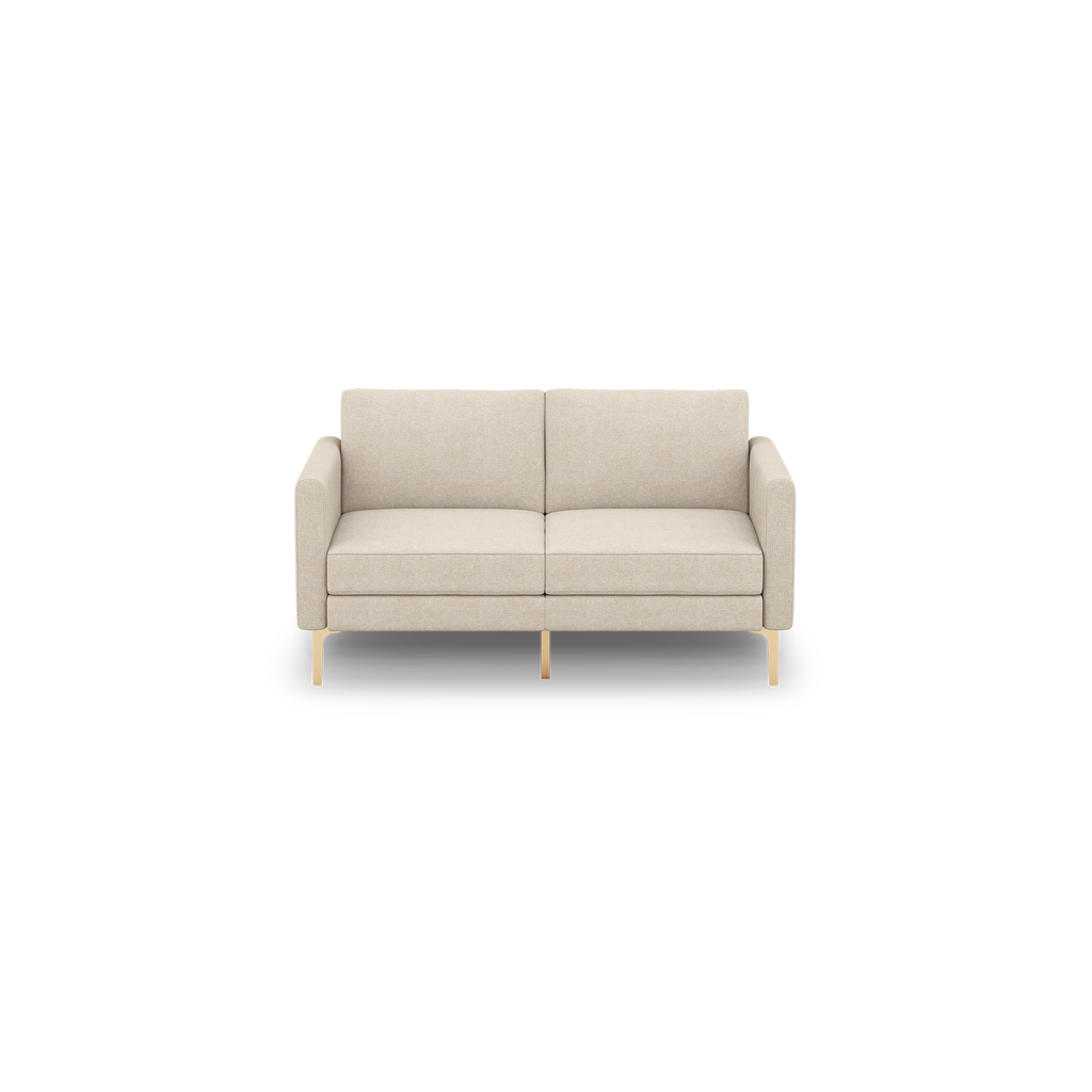 Modern beige two-seater sofa with clean lines, cushioned seats and backrests, and light wooden legs on black background.