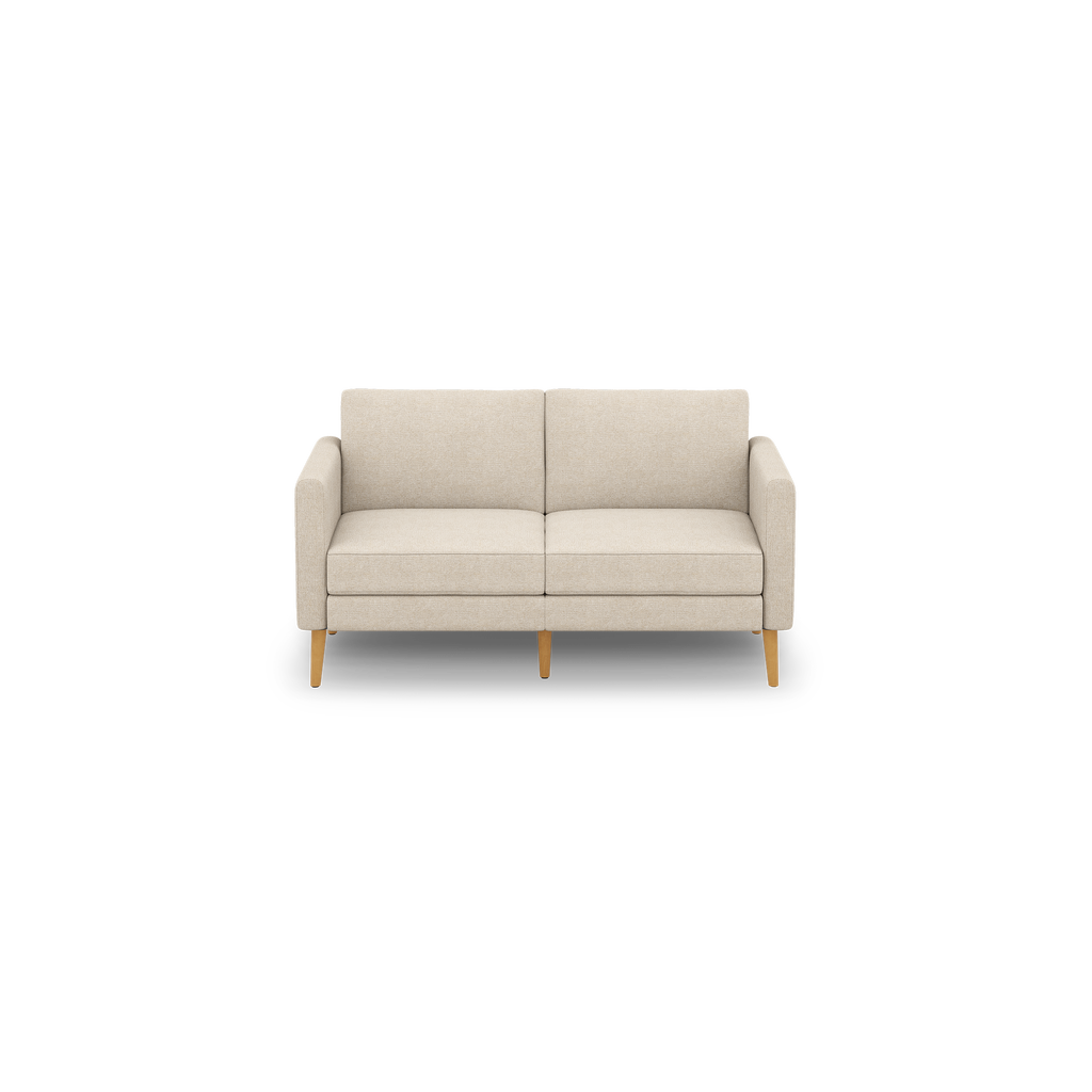 Beige two-seater sofa with clean lines, square armrests, cushioned seats and backrests, supported by four wooden legs.