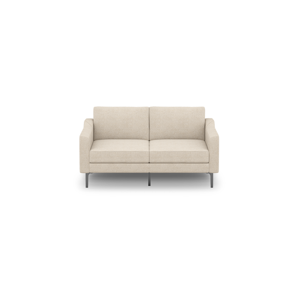 Beige two-seater sofa with straight armrests, cushioned seats and backrests, and slender black metal legs on a black background.