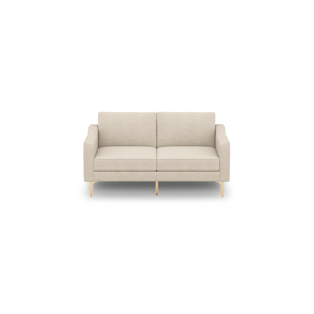 Beige two-seater sofa with clean lines, rectangular cushions, padded armrests, and light wooden legs.