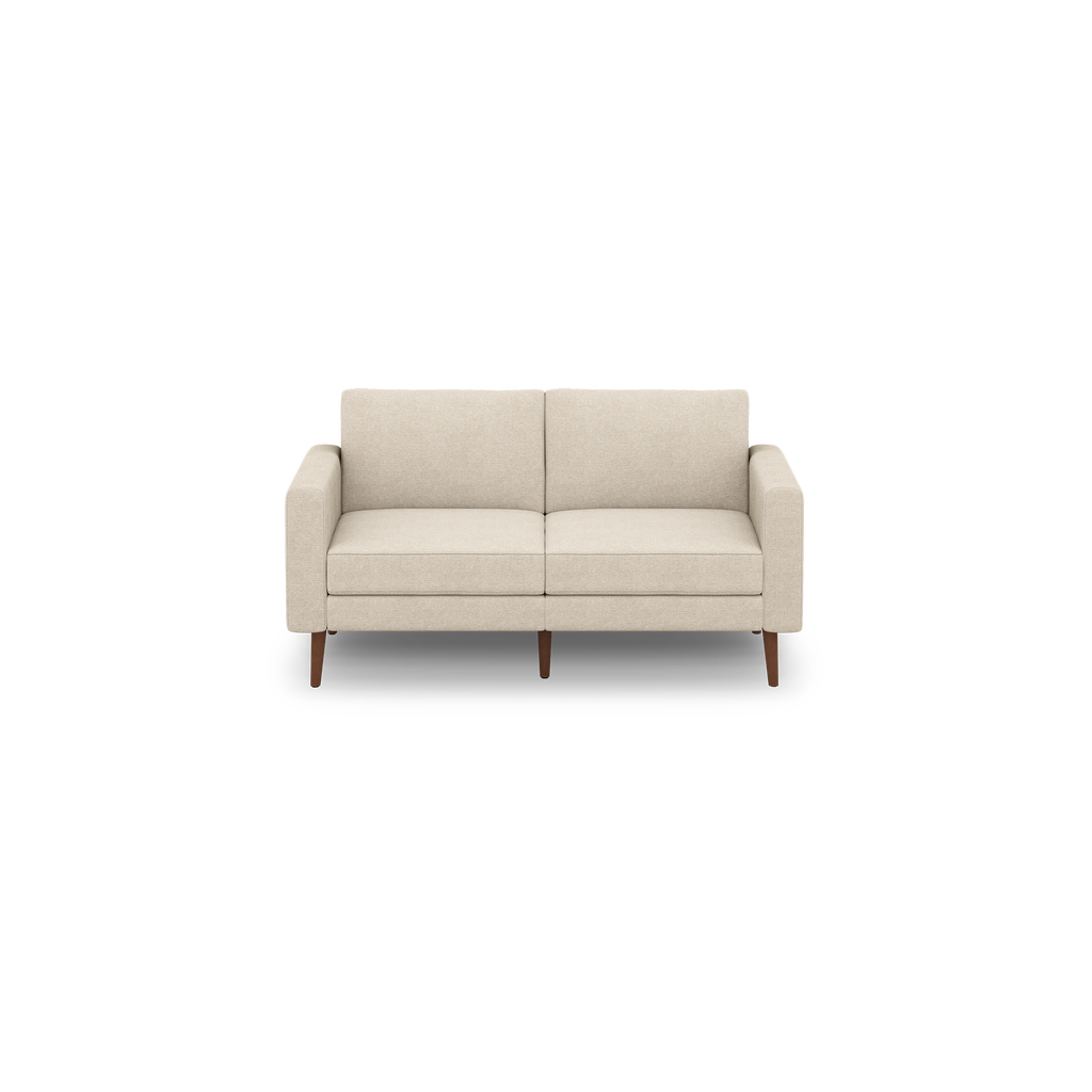 Beige two-seater sofa with fabric upholstery, straight armrests, and wooden tapered legs against a black background.