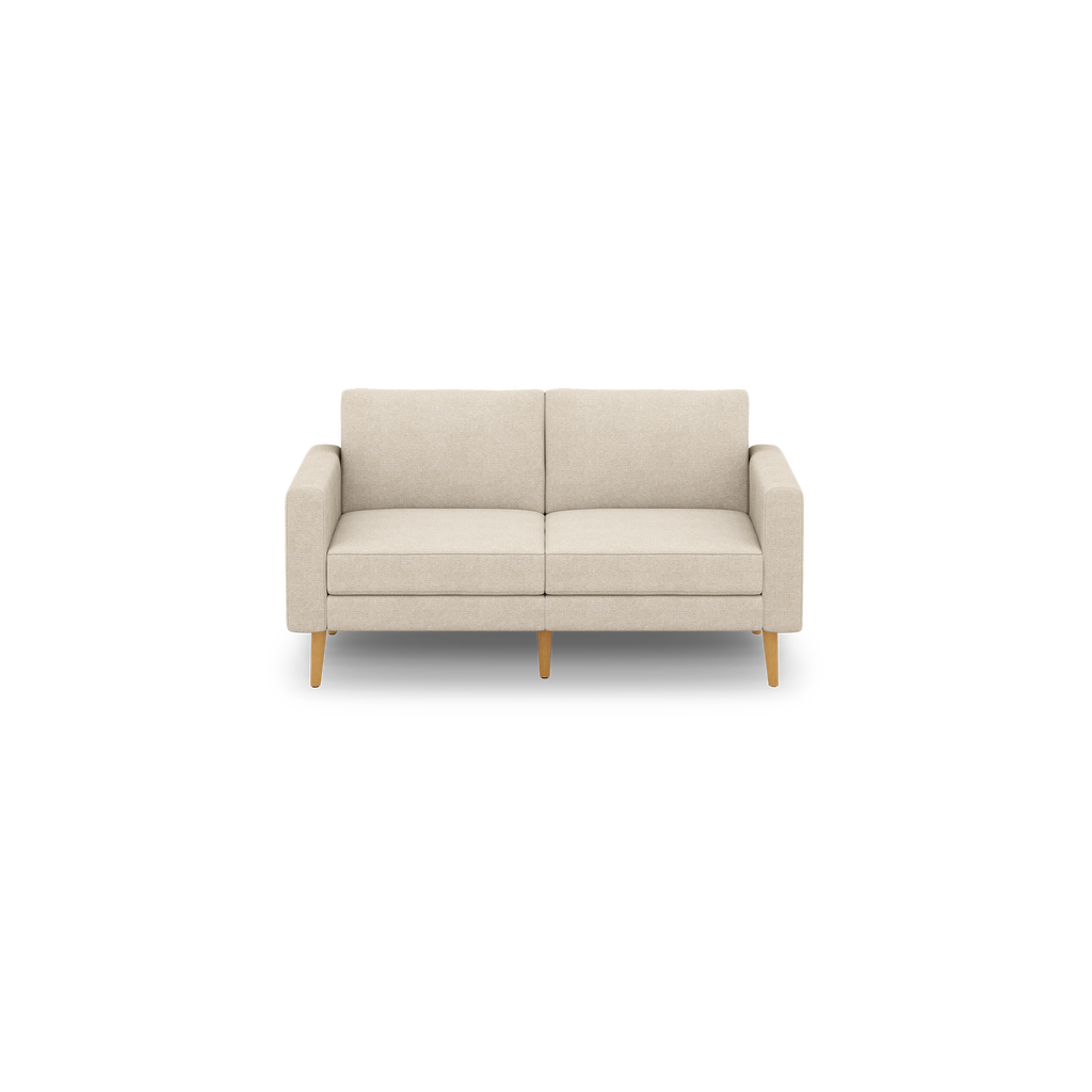 Beige two-seater sofa with clean lines, cushioned backrest and seats, and natural wooden legs, set against a black background.