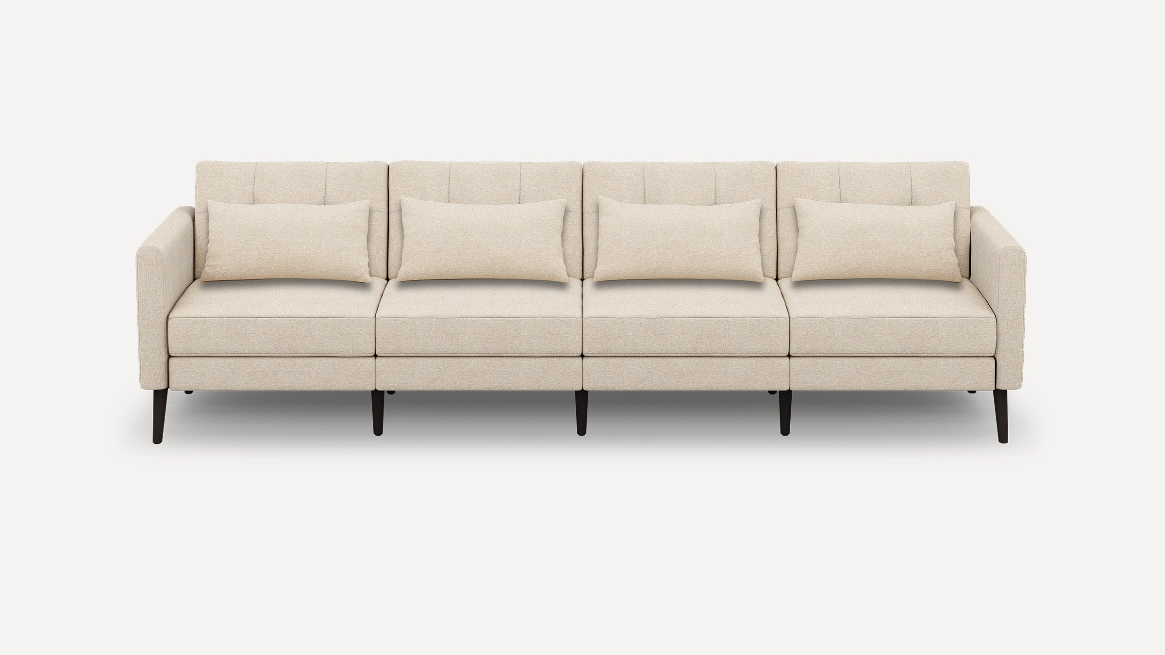Four-seater beige fabric sofa with minimalistic design, featuring straight arms, rectangular cushions, and dark wooden legs.