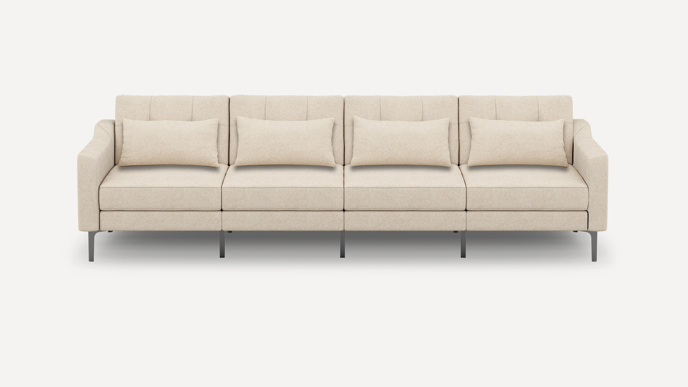 Beige modern four-seater sofa with rectangular cushions, thin armrests, and slim metal legs against a white background.