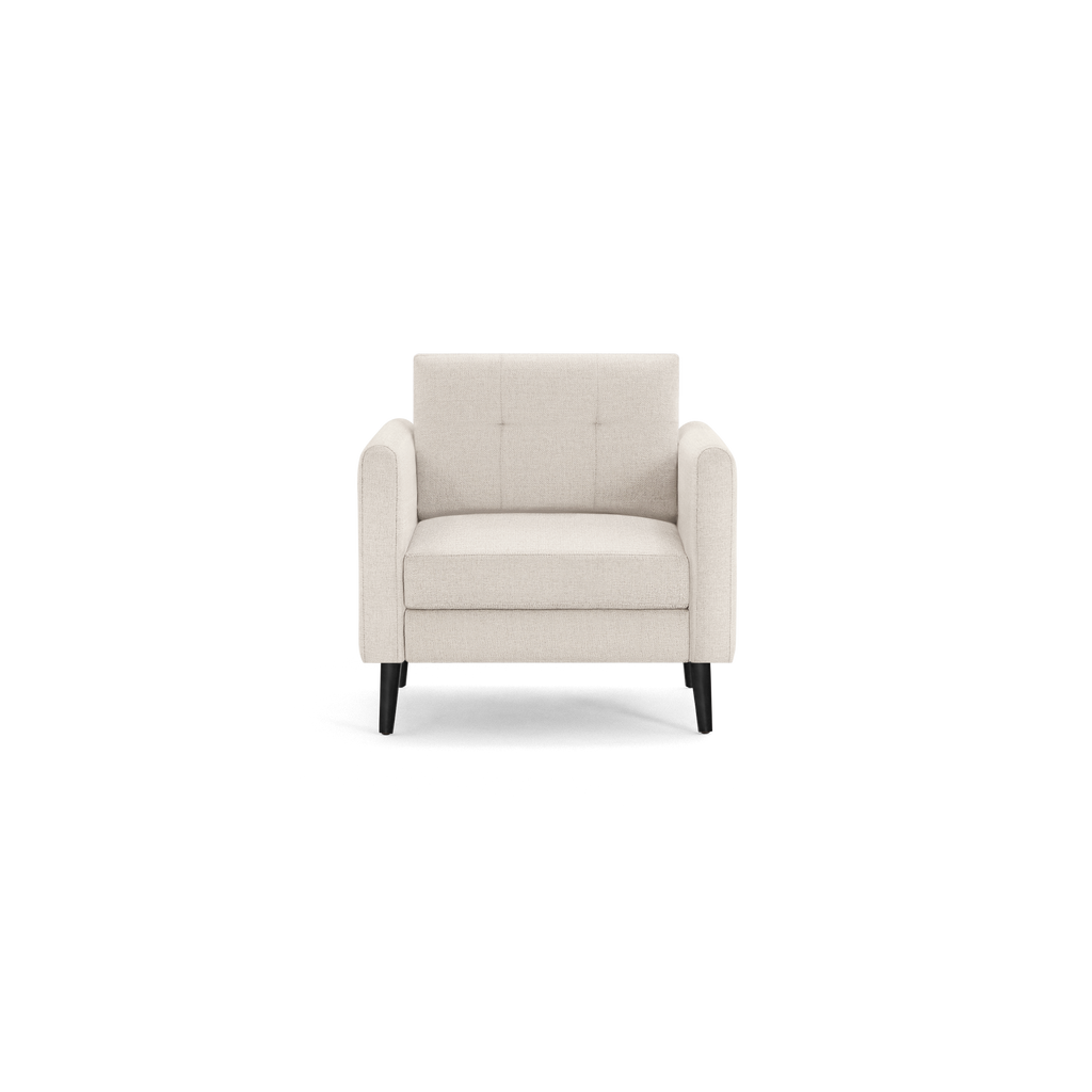 Modern beige upholstered armchair with tufted backrest, cushioned seat, and black wooden legs, set against a black background.