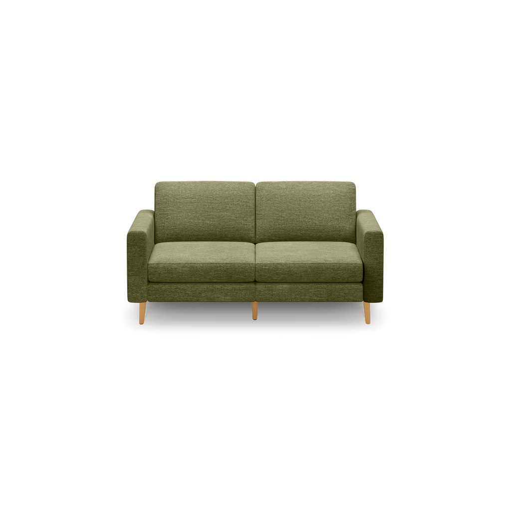 Green two-seater sofa with rectangular cushions, straight armrests, and light wood tapered legs on black background.