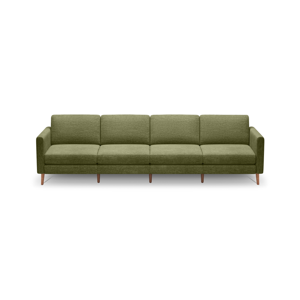 Modern olive green fabric four-seater sofa with wooden legs and boxy armrests, displayed on a black background.