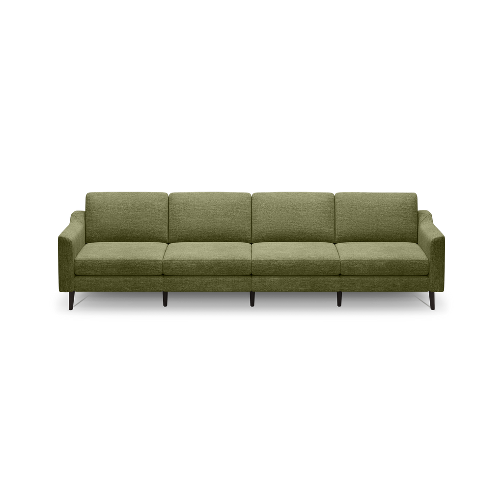 Large modern olive green fabric sofa with clean lines, four seat cushions, and slim wooden legs on a black background.