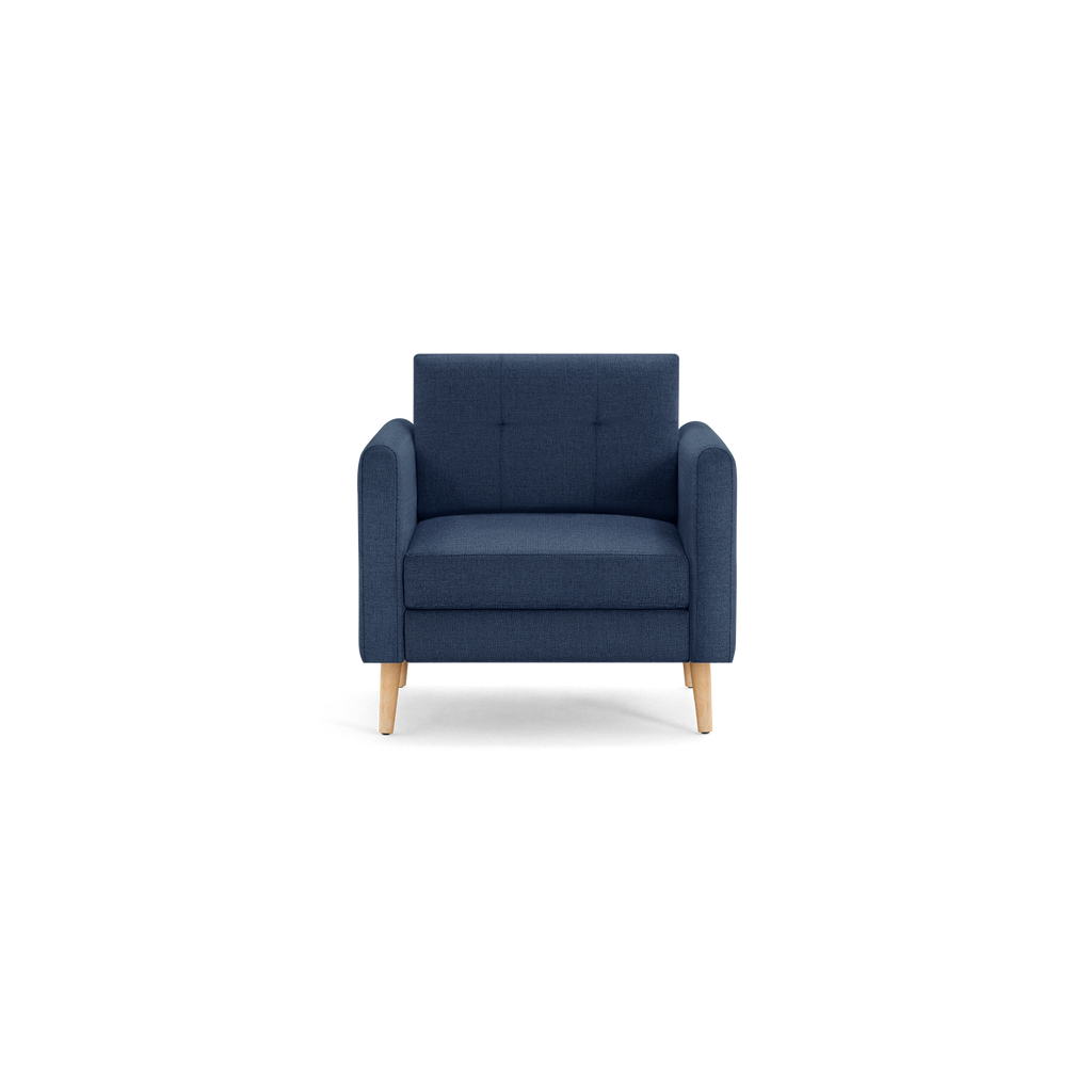 Front view of a modern navy blue upholstered armchair with wooden legs and cushioned seat and backrest.