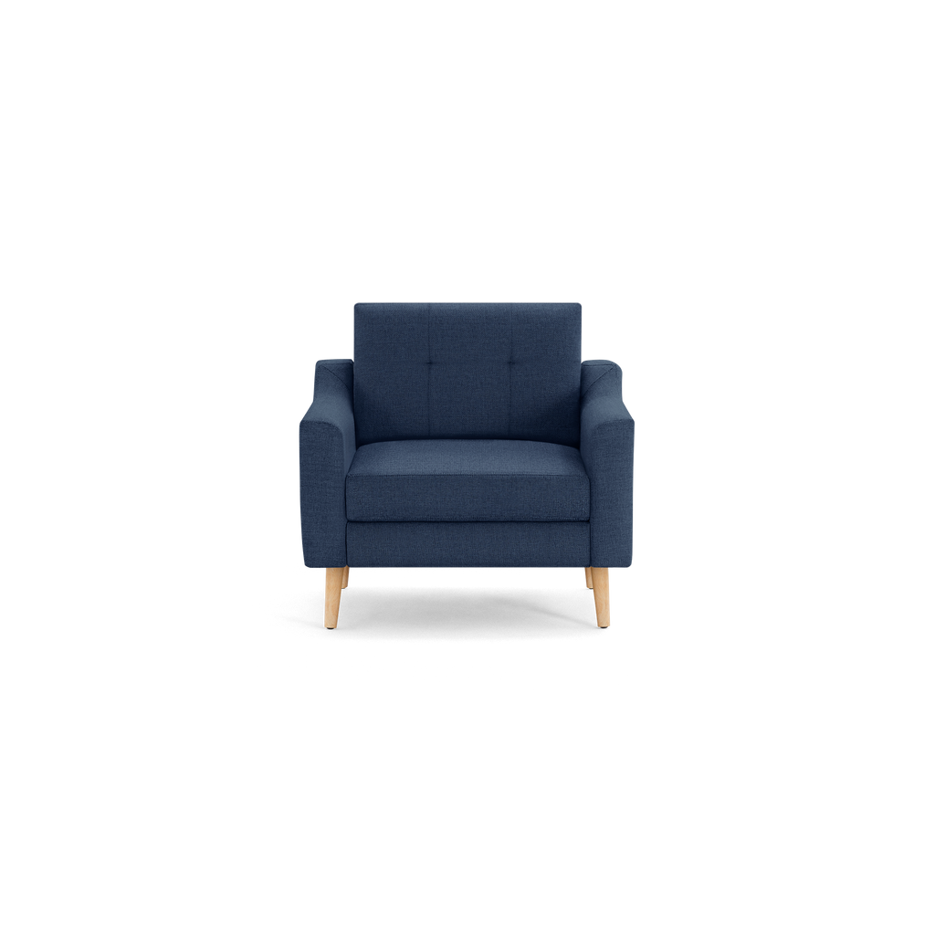 Modern navy blue upholstered armchair with wooden legs and minimalist design, featuring a cushioned seat and tufted backrest.