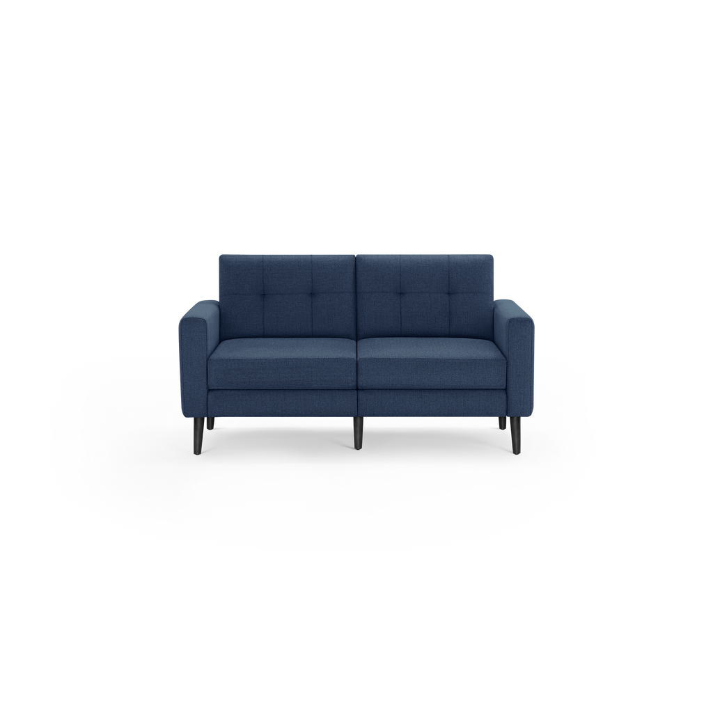 Mid-century modern navy blue fabric loveseat sofa with tufted backrest cushions and slim black wooden legs.