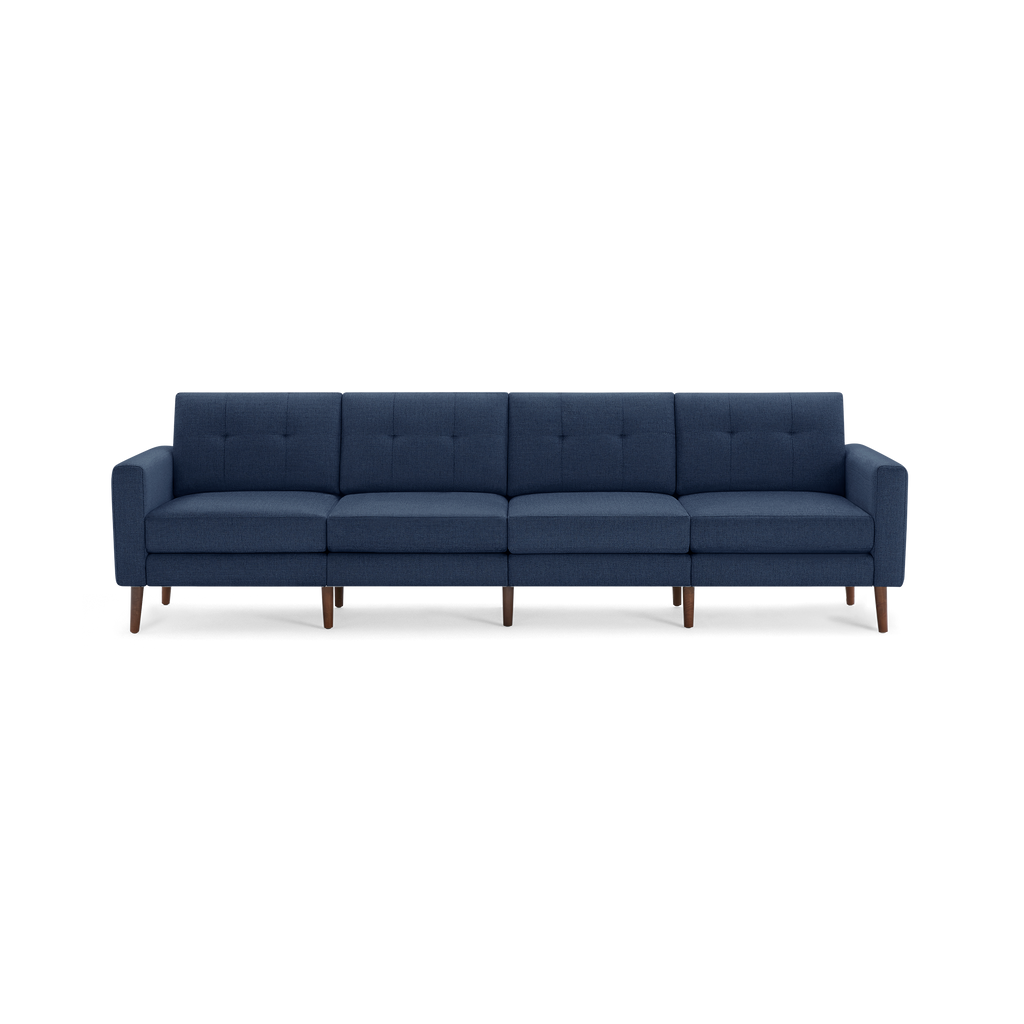 Modern navy blue fabric sectional sofa with button-tufted backrests, straight arms, and wooden legs.
