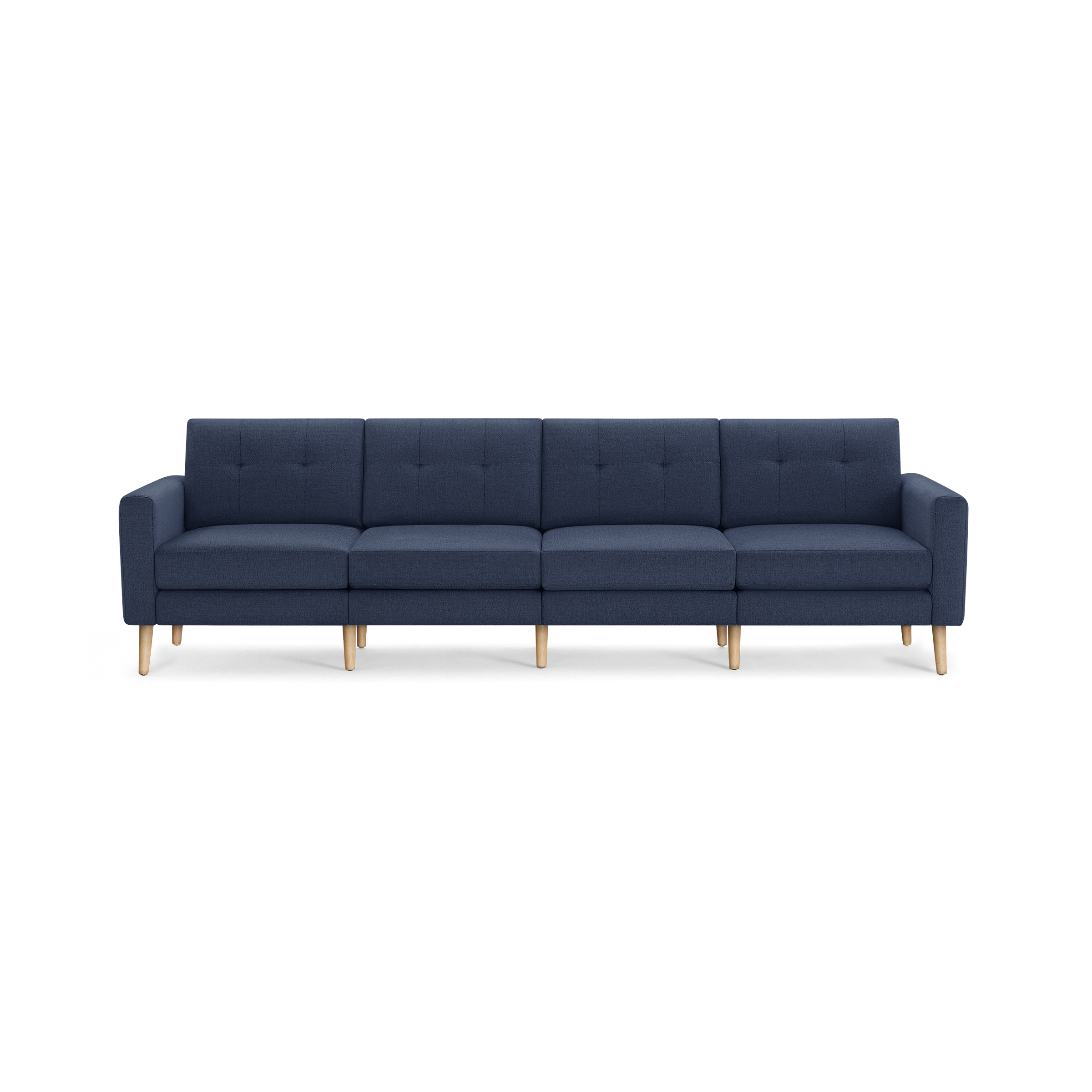 Modern navy blue four-seater sofa with tufted back cushions, wooden legs, and clean-lined armrests, designed for spacious living rooms.