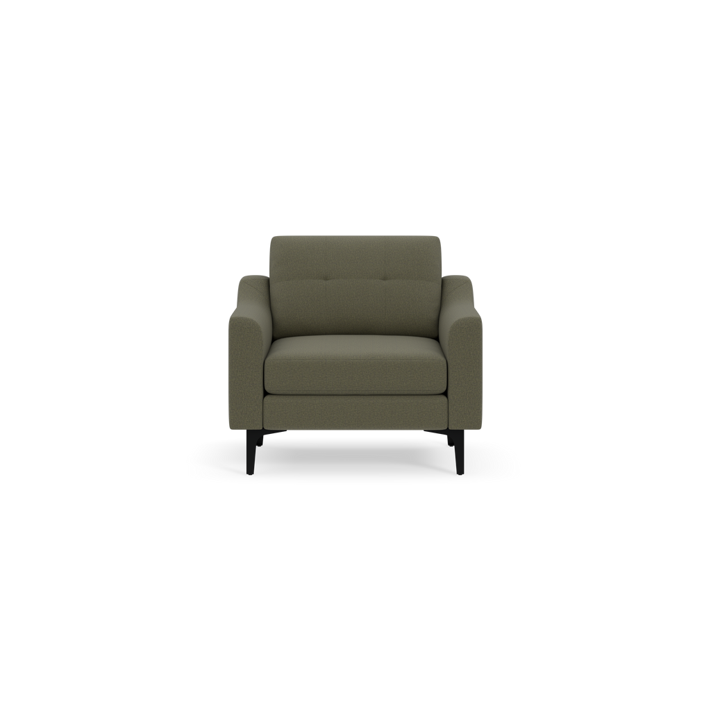Green upholstered armchair with tufted backrest, cushioned seat, and black wooden legs, shown on black background.