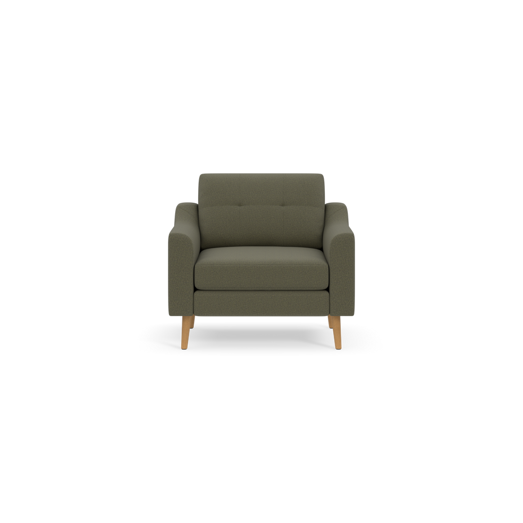 Modern Moss green upholstered armchair with wooden legs, tufted back cushion, and wide armrests, shown against black background.