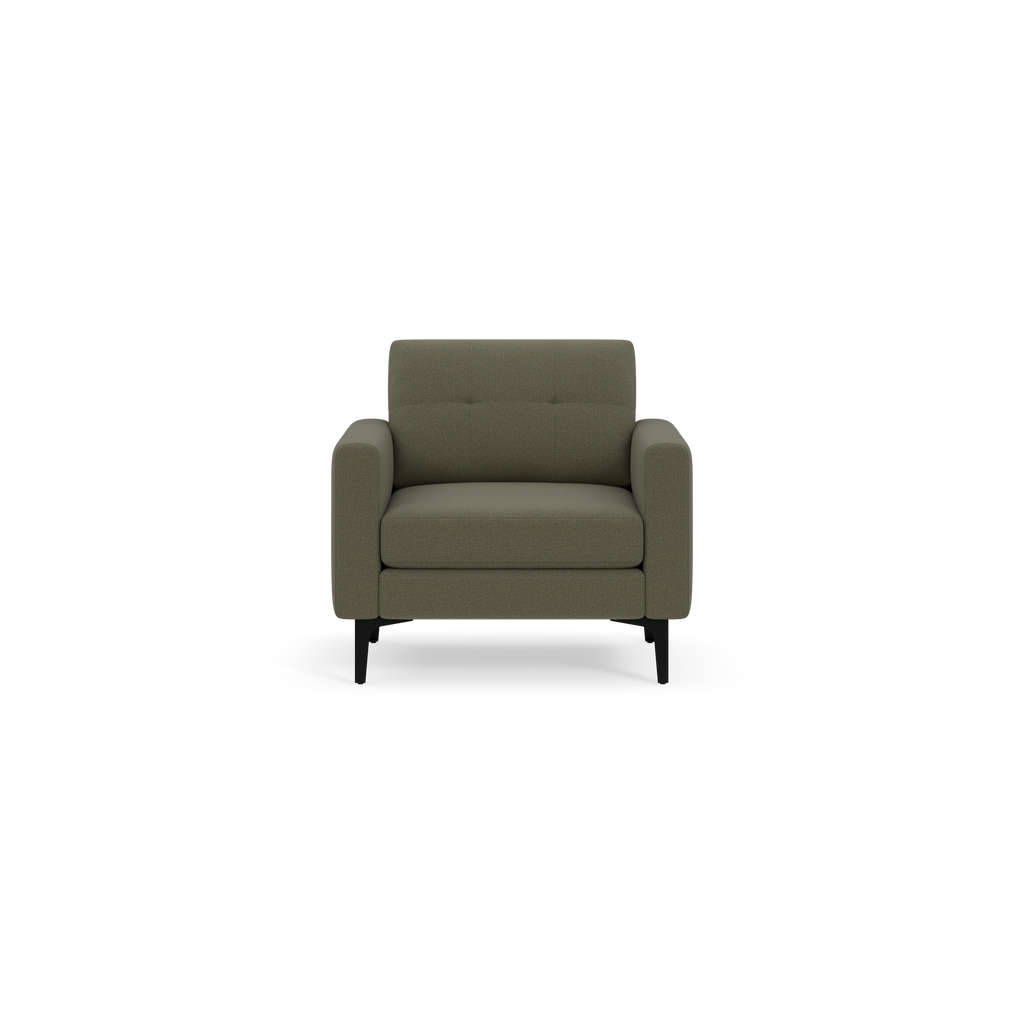Modern Moss green upholstered armchair with tufted backrest and black tapered legs, shown against black background.