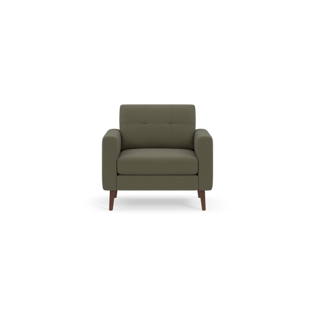 Green upholstered armchair with wooden legs, featuring a cushioned seat and backrest with subtle button tufting.