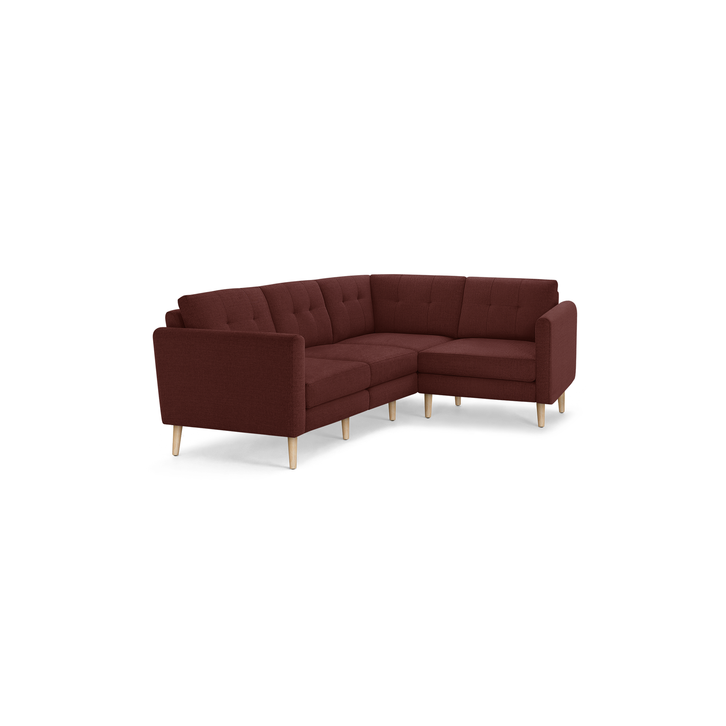 Modern L-shaped sectional sofa in deep red fabric with tufted back cushions and light wooden legs.