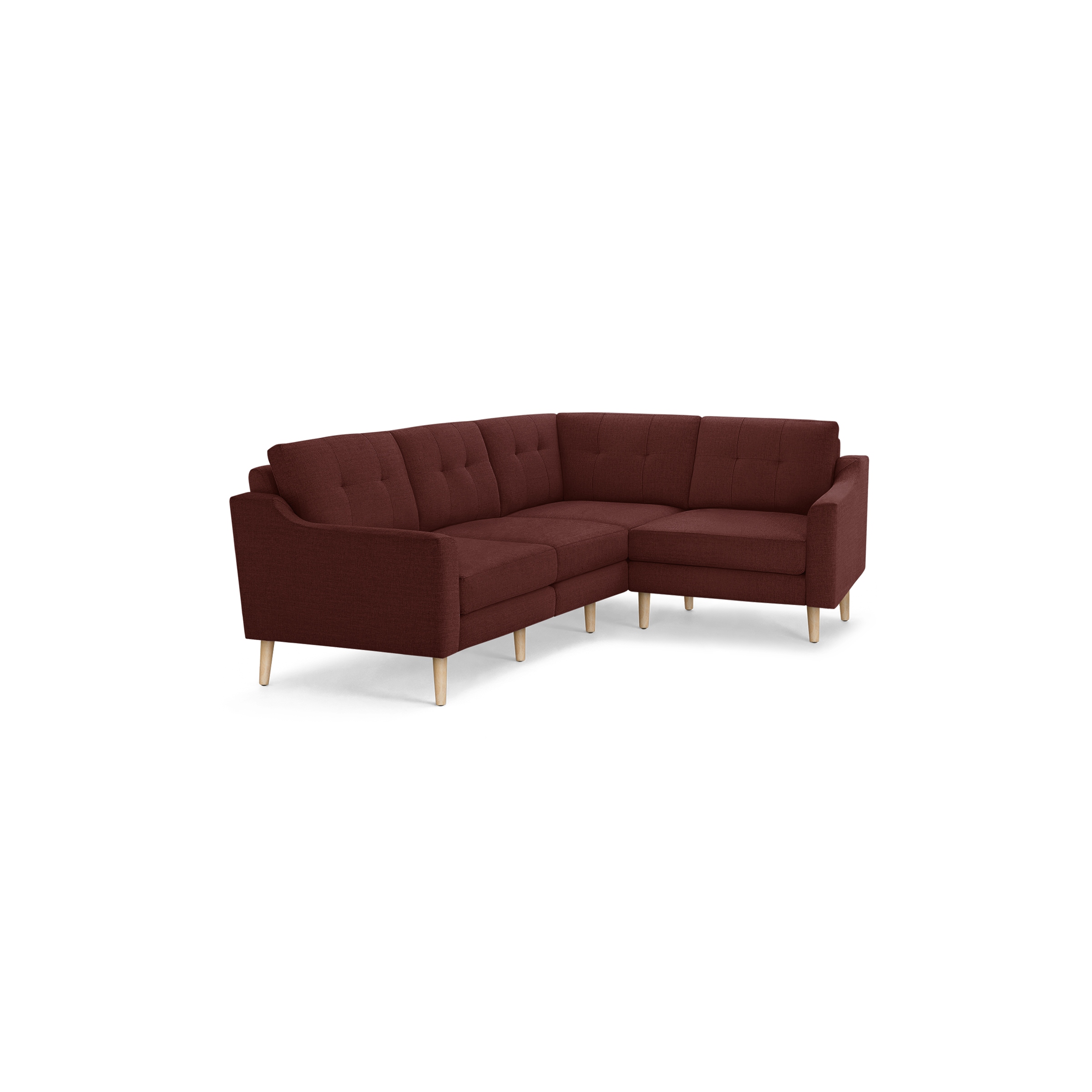 L-shaped sectional sofa with deep red fabric upholstery, tufted back cushions, and light wooden legs.