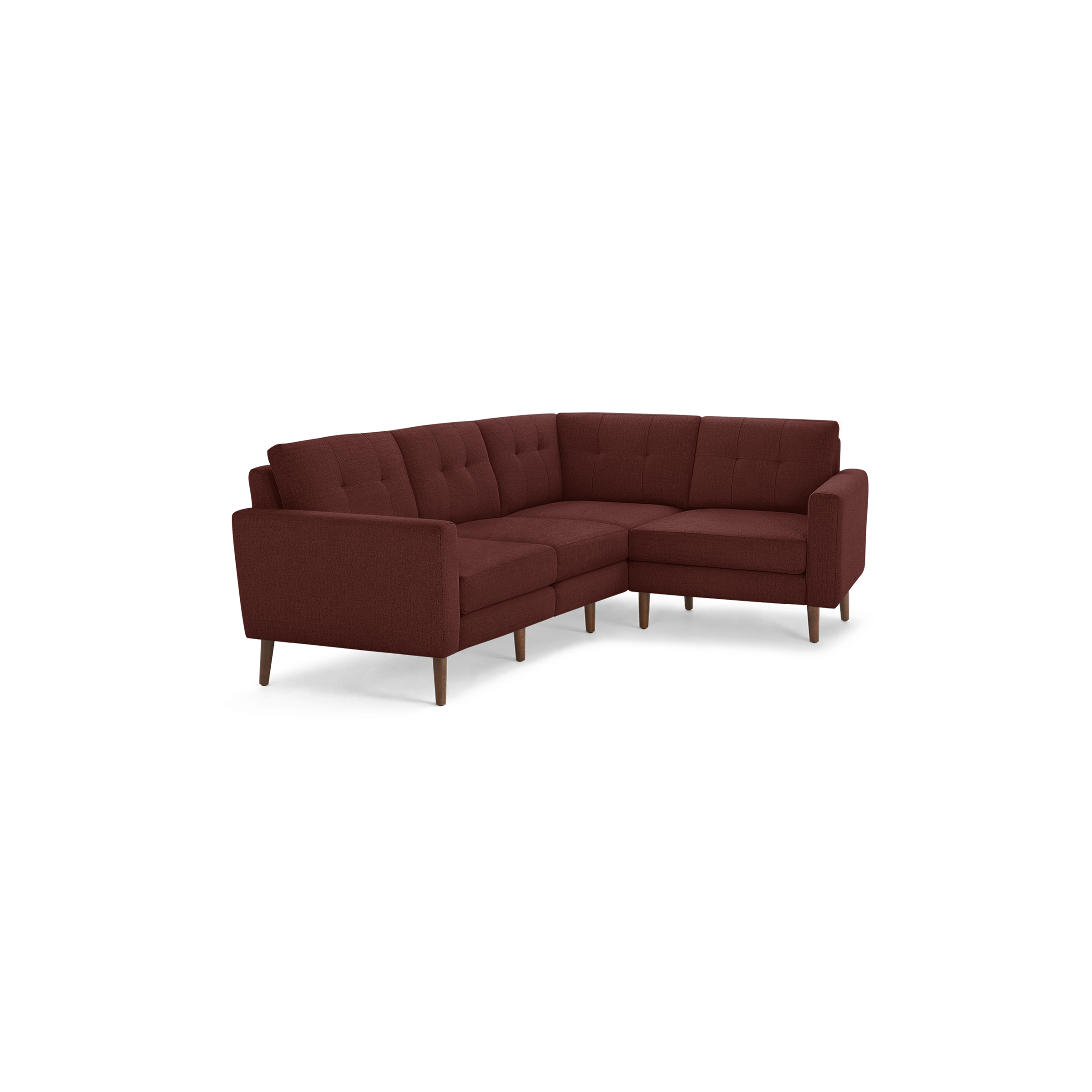 Red upholstered L-shaped sectional sofa with tufted back cushions and wooden legs, designed for modern living spaces.