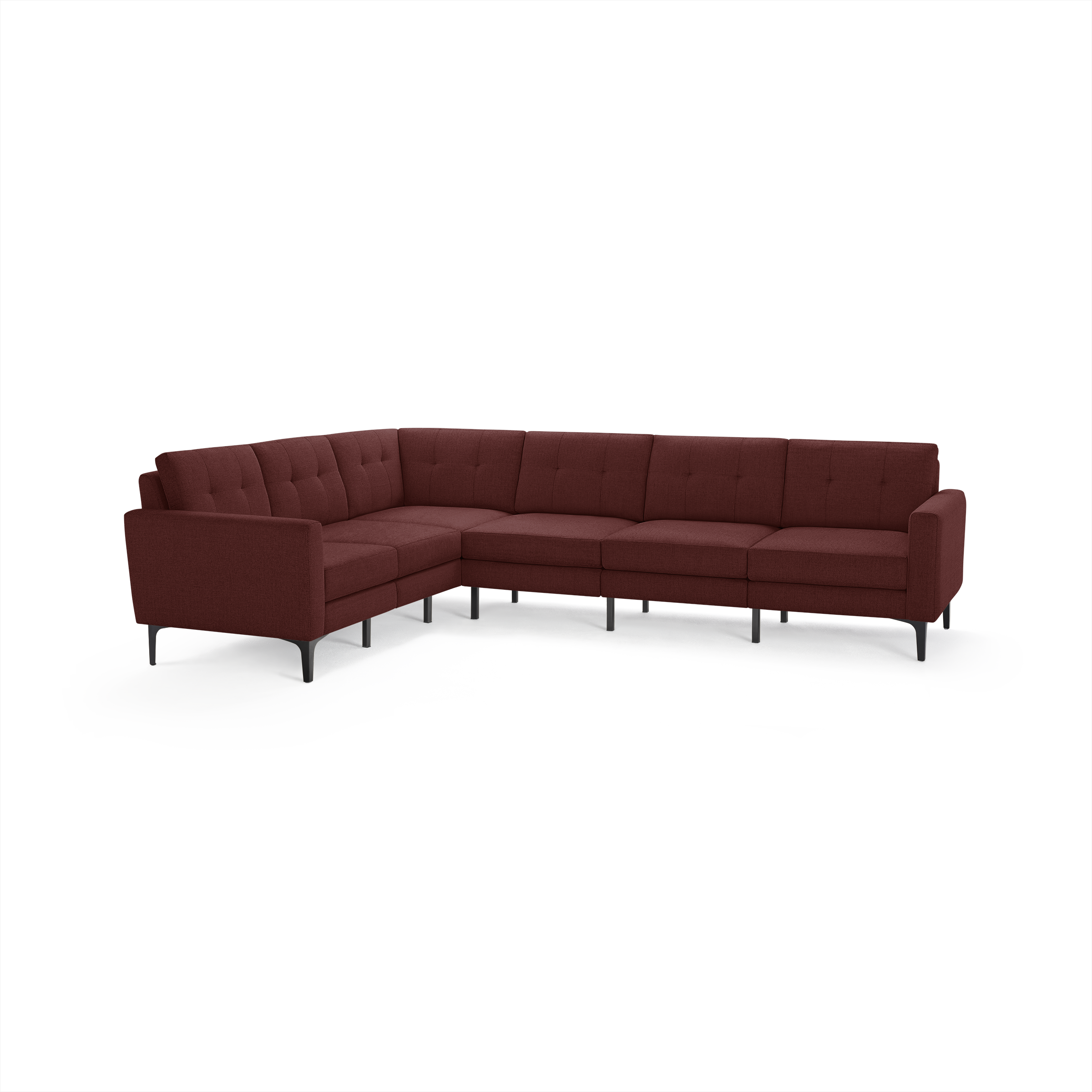 Large modern L-shaped sectional sofa upholstered in dark red fabric with tufted back cushions and black metal legs.