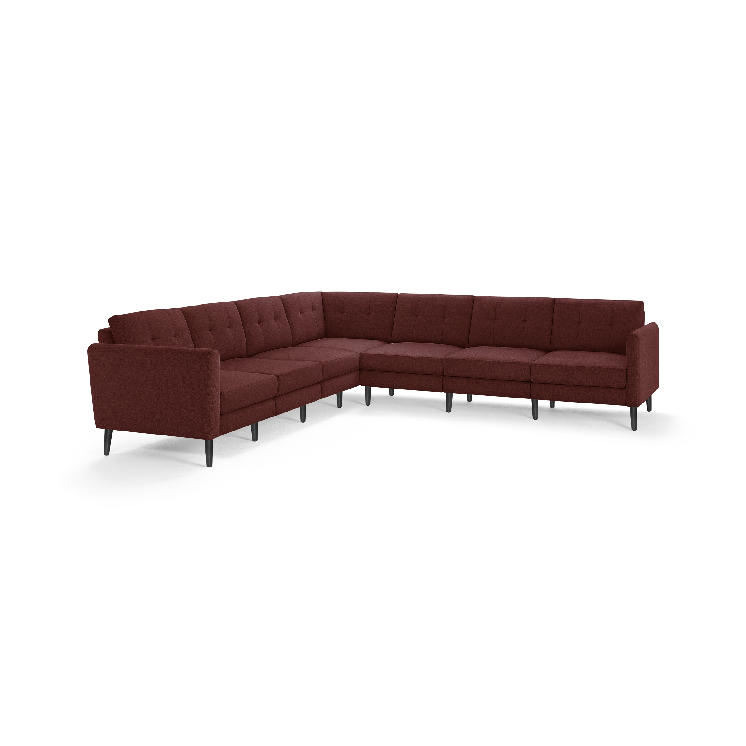 Large modern L-shaped sectional sofa with deep red upholstery and button-tufted back cushions on slender black legs.