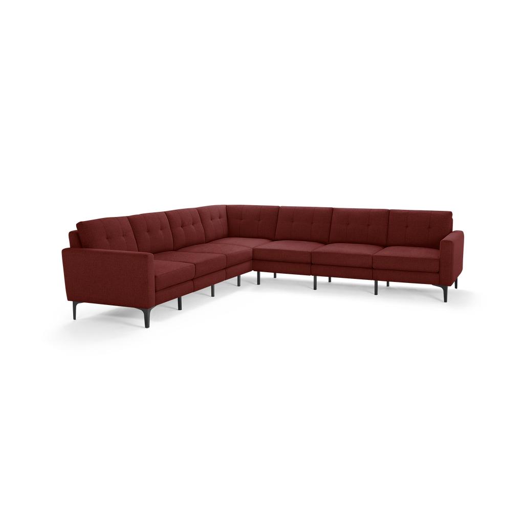 Modern L-shaped sectional sofa in deep red fabric with tufted cushions and sleek black metal legs.