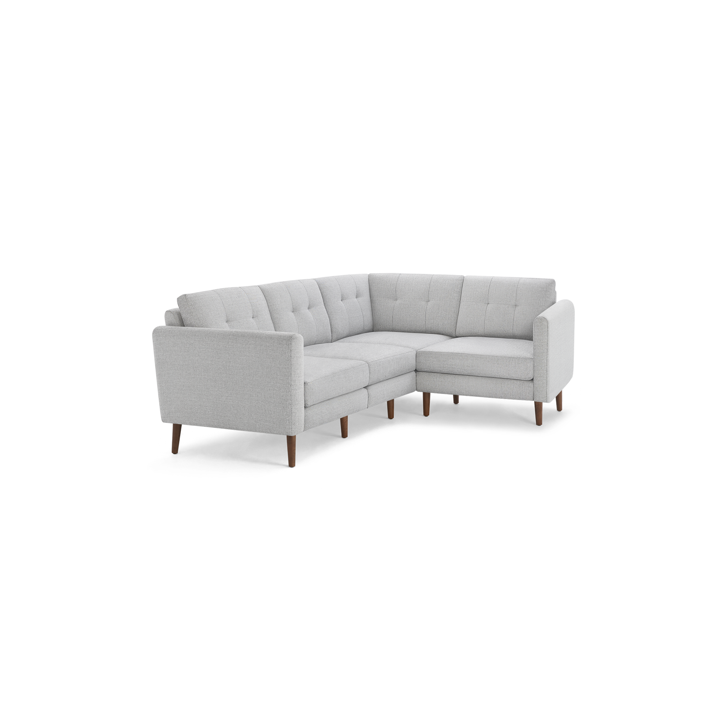 Modern light gray sectional sofa with tufted back cushions and wooden tapered legs, designed for corner placement and comfortable seating.