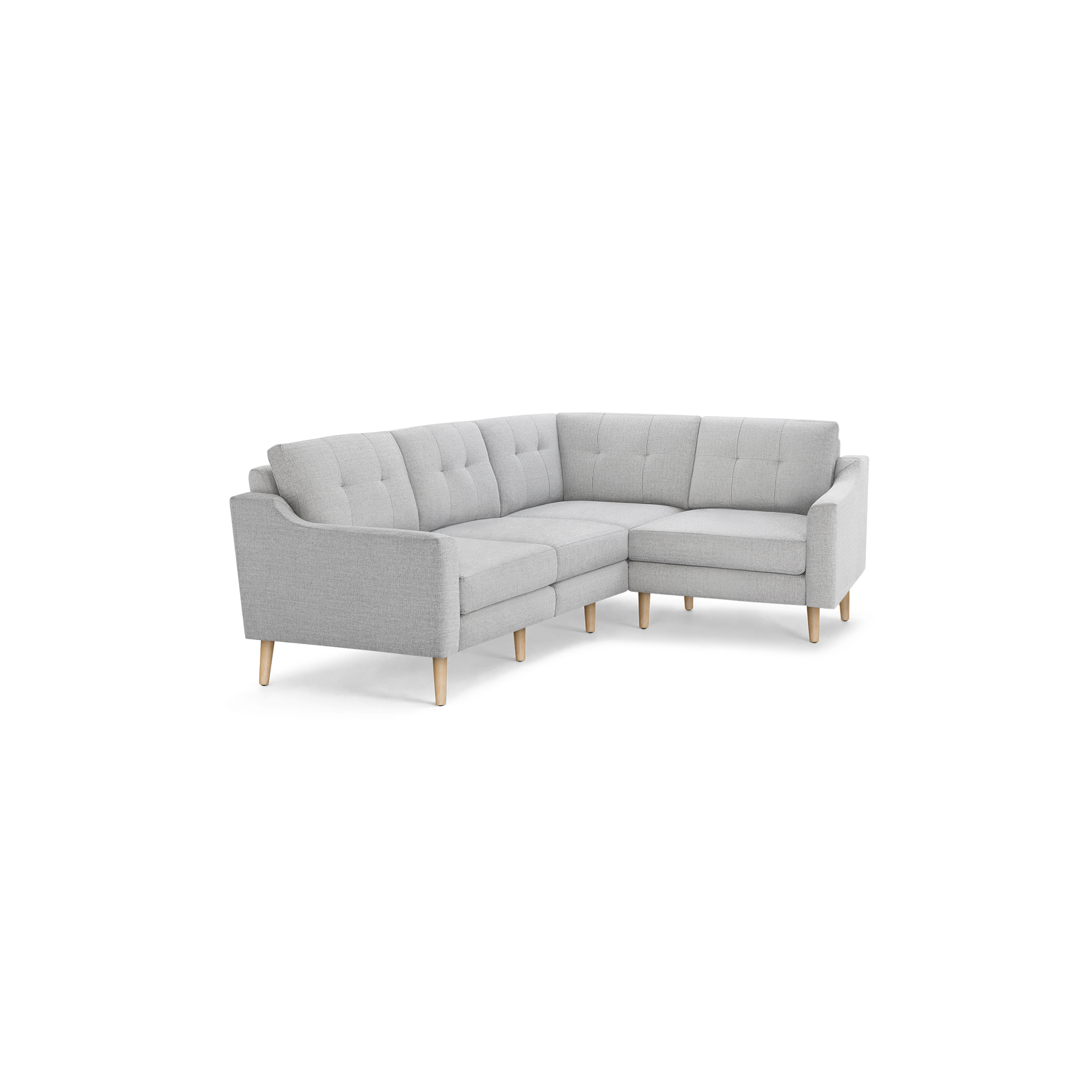 Light gray L-shaped sectional sofa with tufted back cushions and wooden legs, modern and minimalist design.