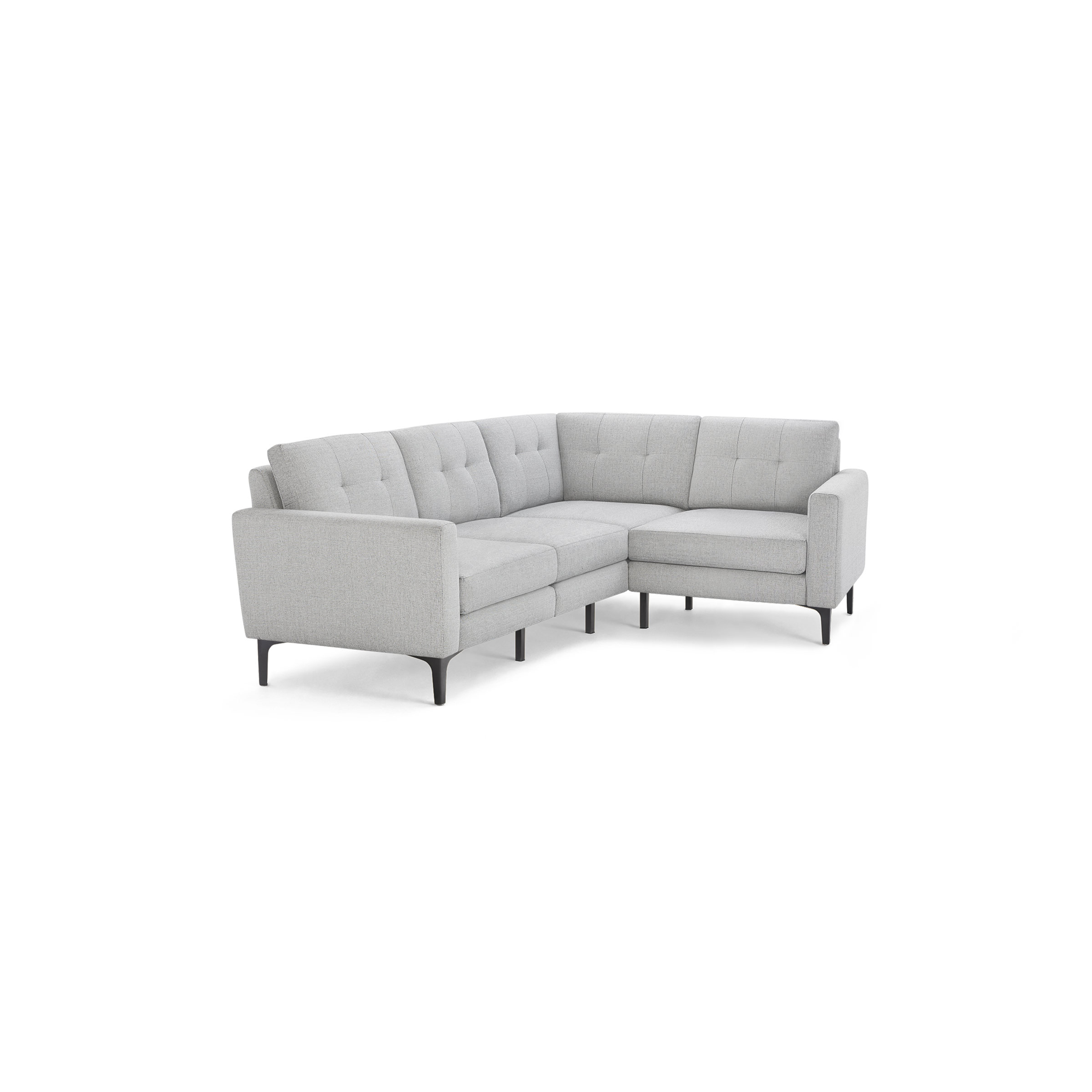 Light gray tufted fabric sectional sofa with modern metal legs and clean, straight arms, shown against a black background.
