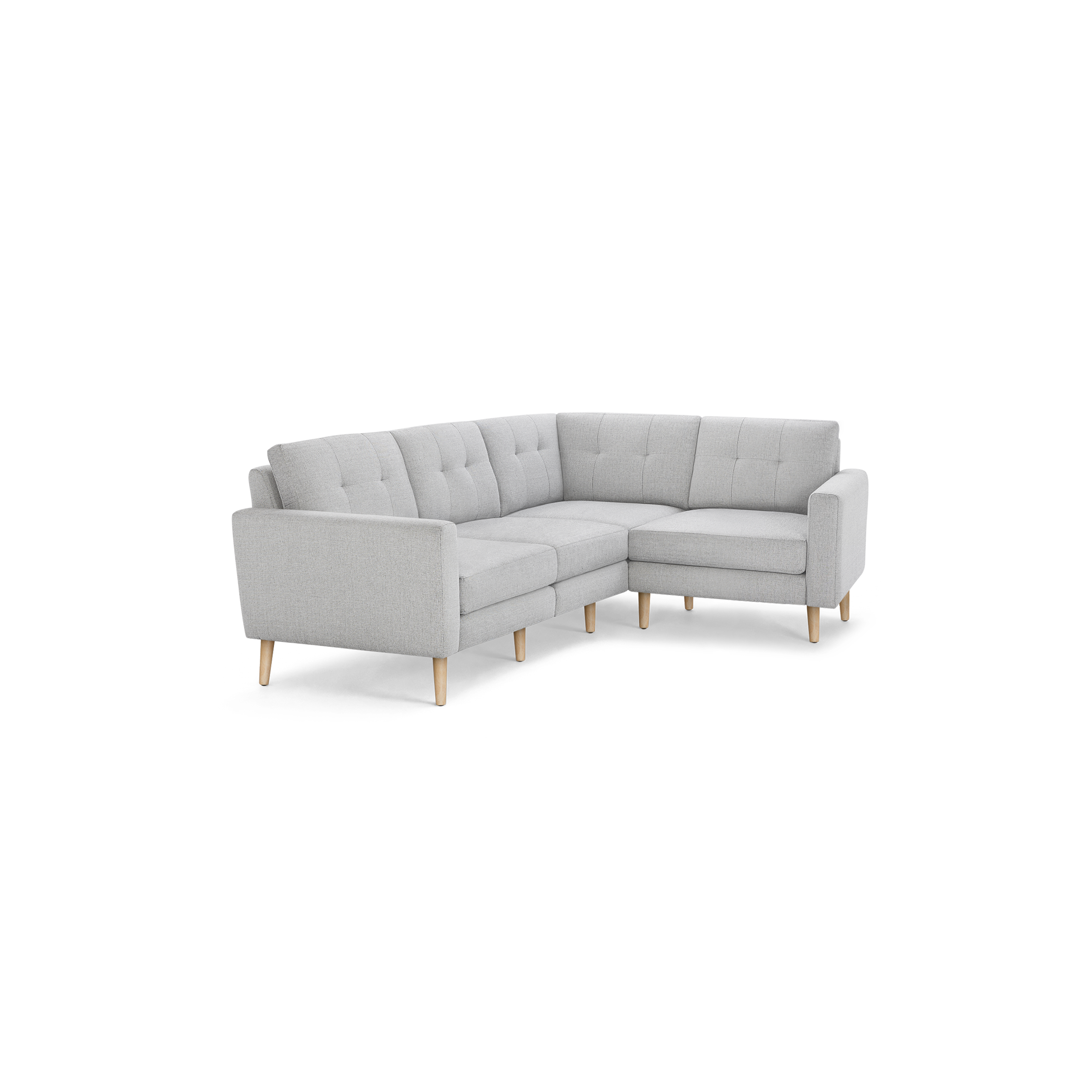 Light gray fabric L-shaped sectional sofa with tufted back cushions and wooden legs, modern minimalist design.