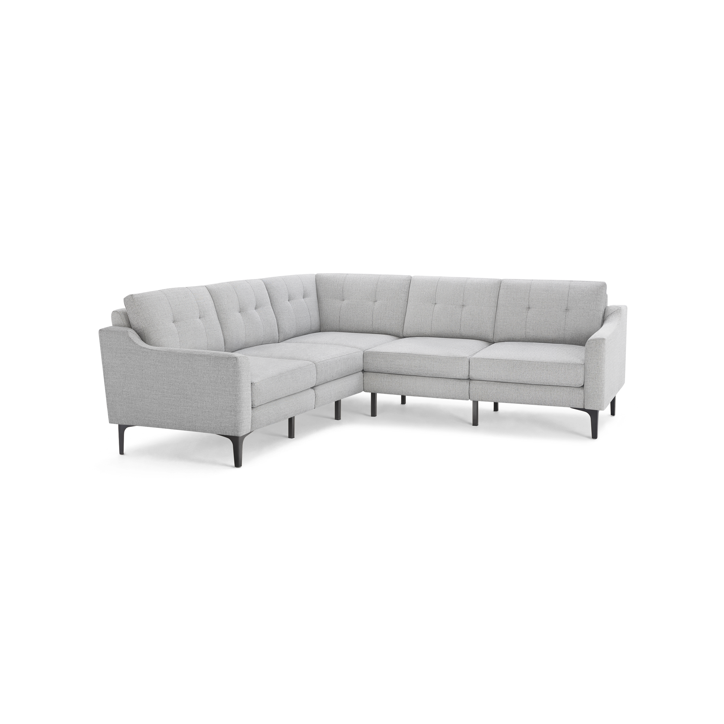 Light gray fabric sectional sofa with tufted back cushions, modern slim armrests, and black tapered legs.