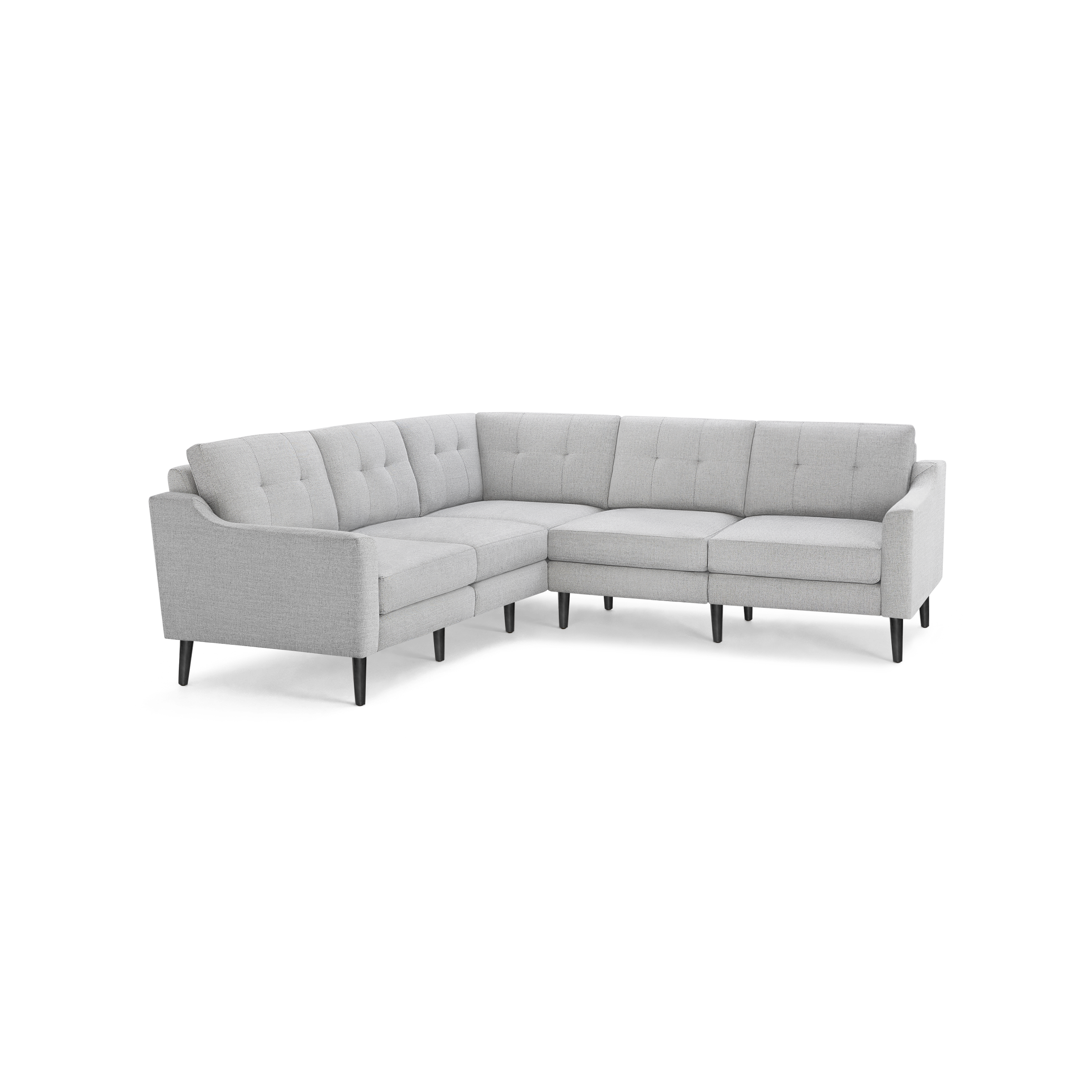 Light gray fabric sectional sofa with tufted back cushions and tapered wooden legs in a modern L-shape design.