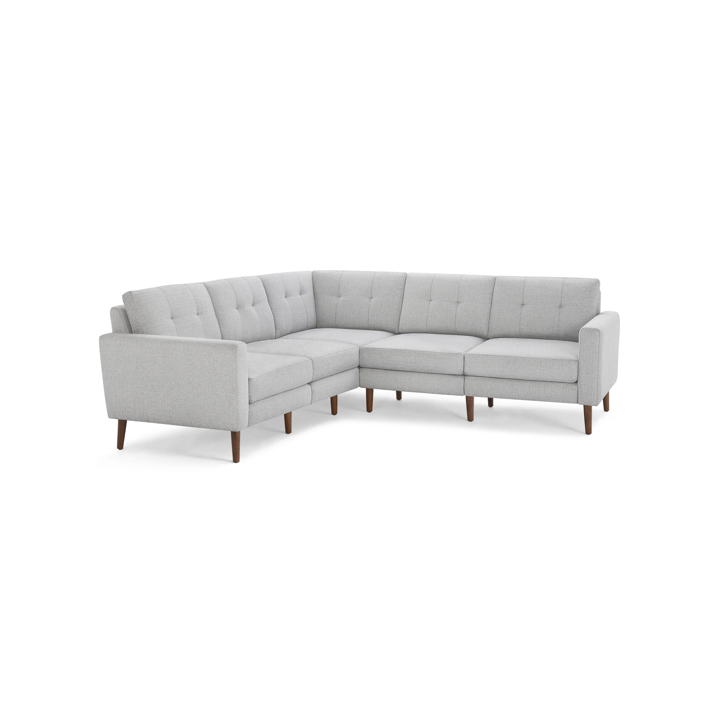 Light gray L-shaped sectional sofa with tufted cushions and wooden legs, modern mid-century design.