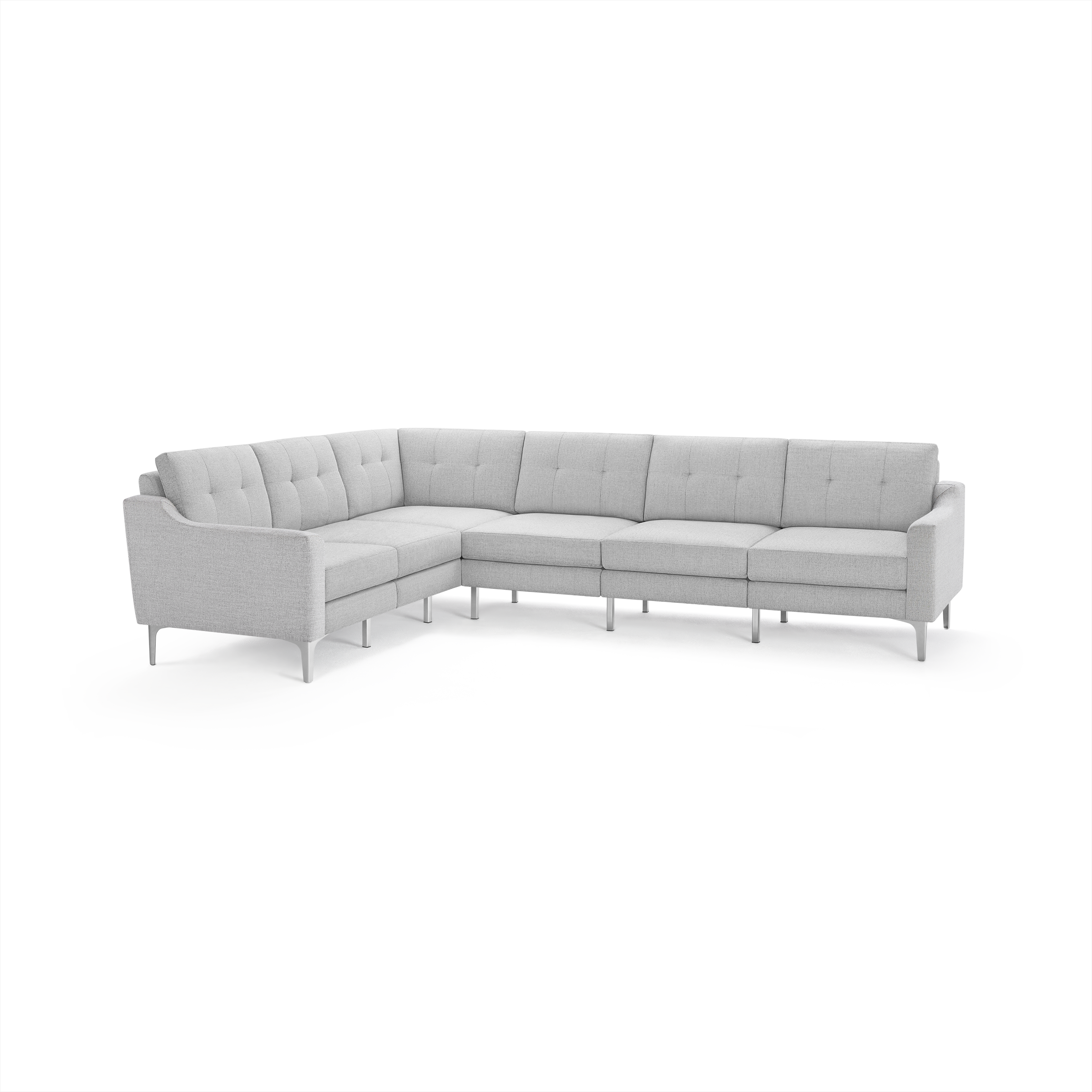 Light gray fabric sectional sofa with tufted back cushions, modern metal legs, and a right-angle corner design.