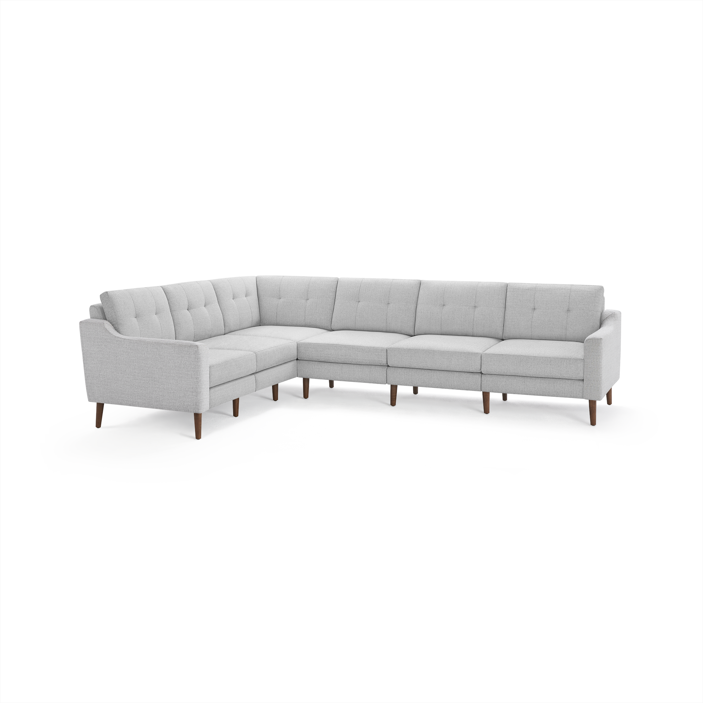 Light gray fabric upholstered L-shaped sectional sofa with tufted back cushions and wooden tapered legs.