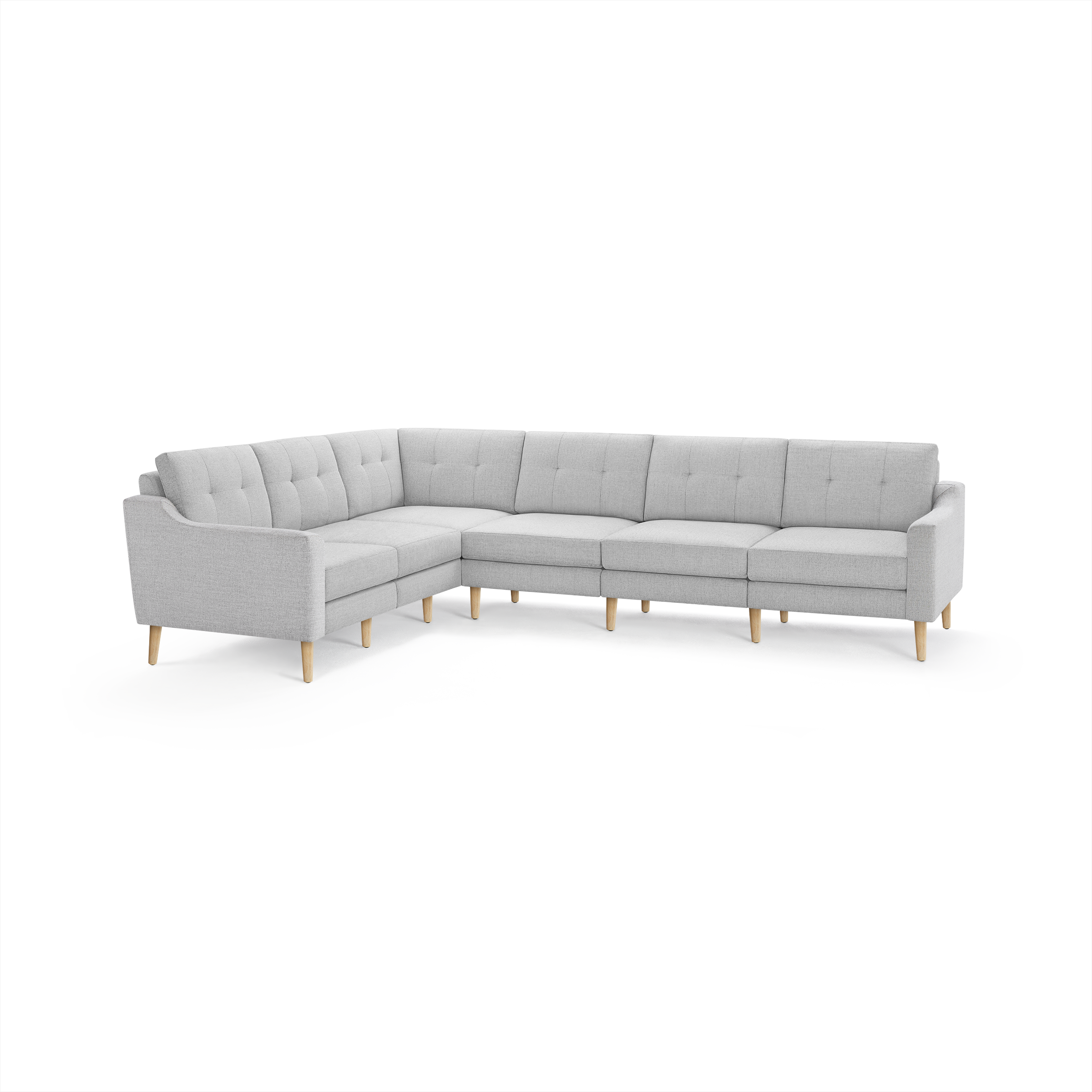 Light gray L-shaped sectional sofa with tufted back cushions and wooden legs, featuring a modern and minimalist design.