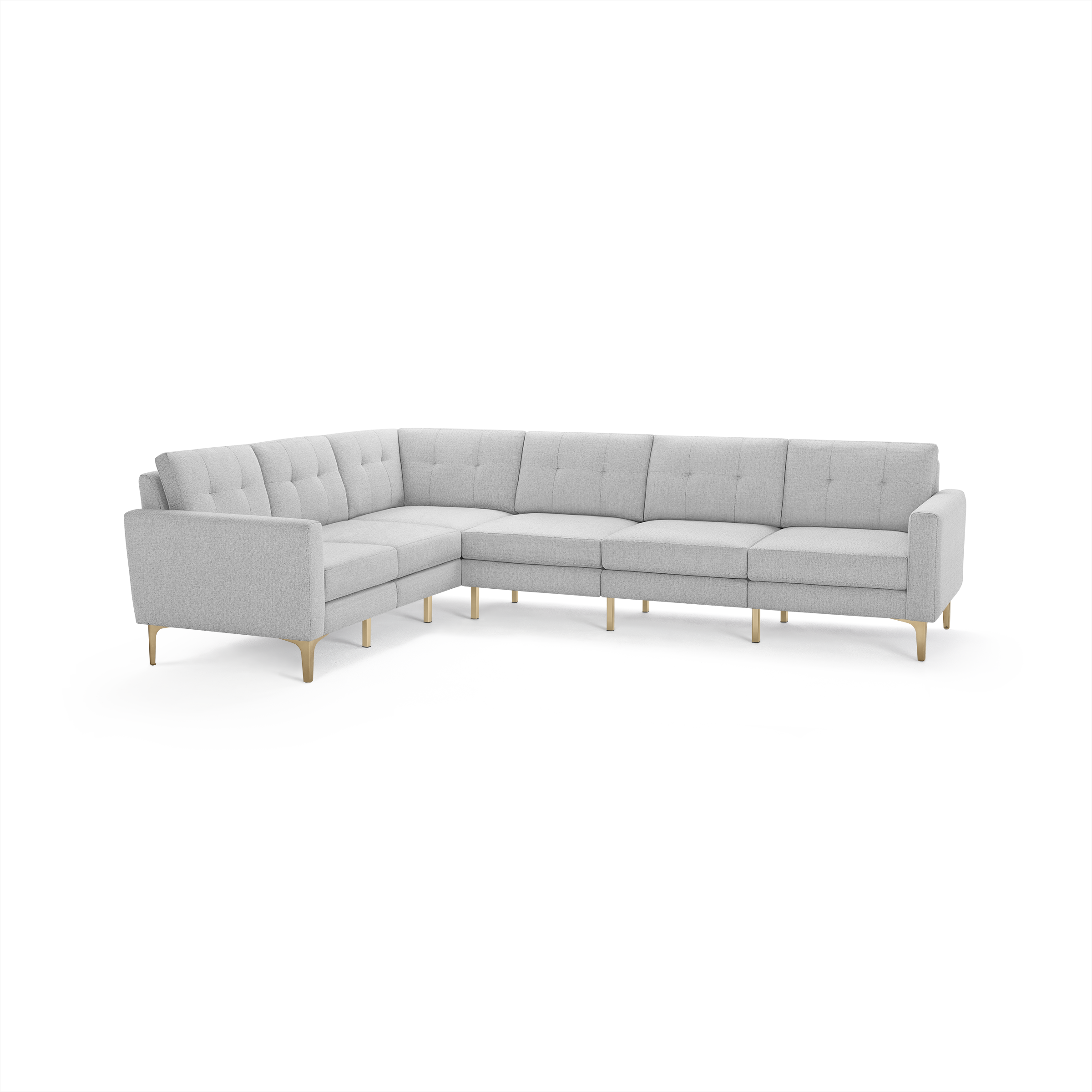 Light gray modern L-shaped sectional sofa with tufted cushions and light wooden legs, designed for spacious seating.