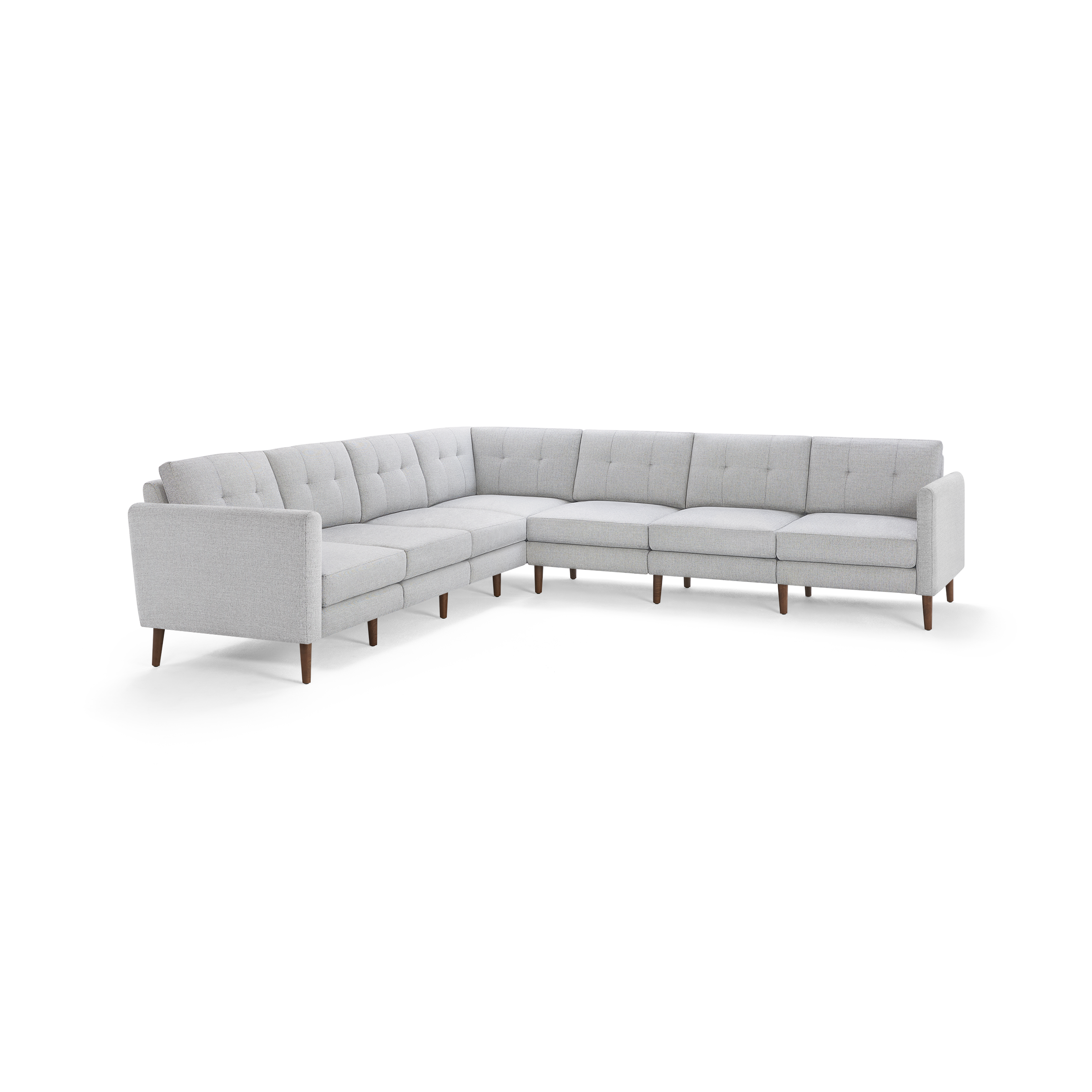 Light gray fabric upholstered L-shaped sectional sofa with tufted back cushions and wooden tapered legs.