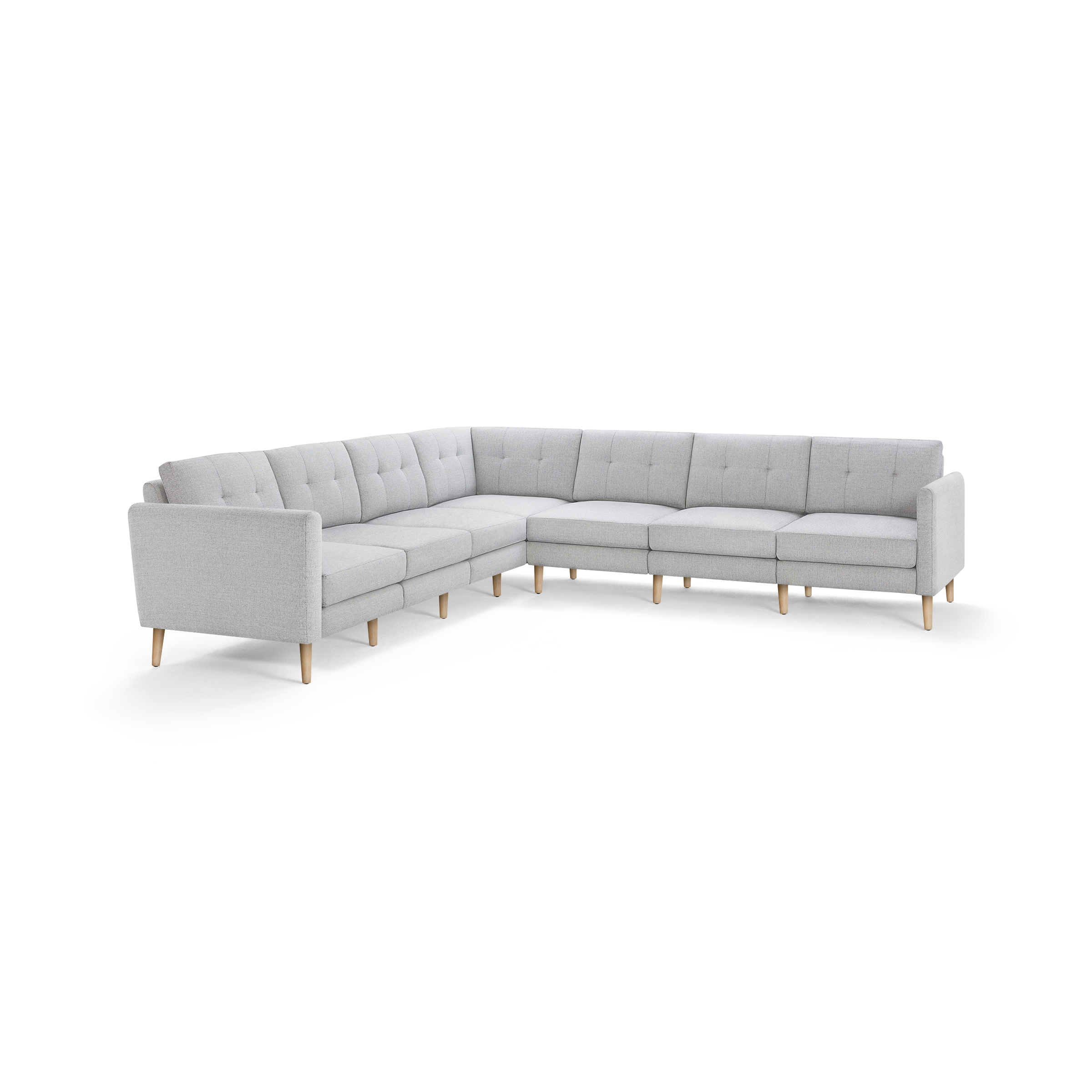 Light gray L-shaped sectional sofa with tufted back cushions and wooden tapered legs, modern and spacious design.