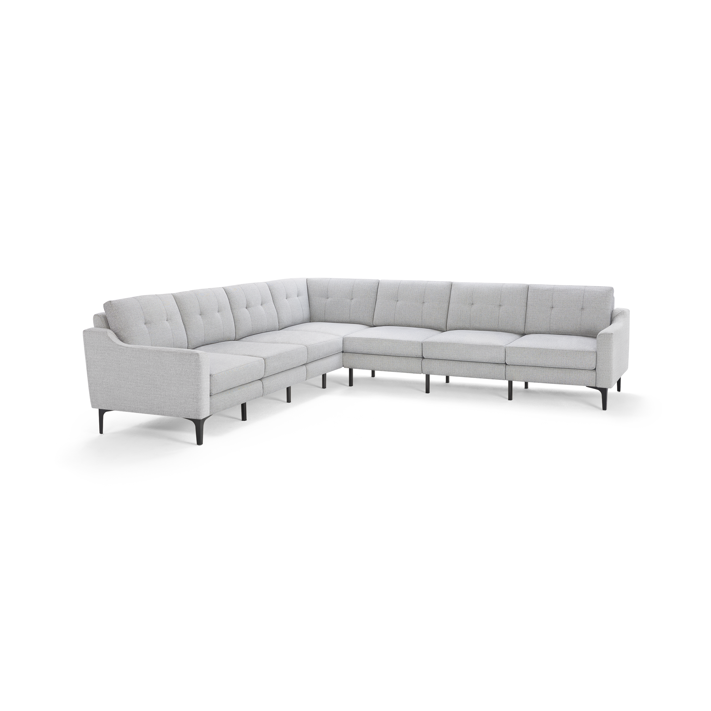 Light gray L-shaped sectional sofa with tufted cushions, slim black legs, and modern mid-century design.