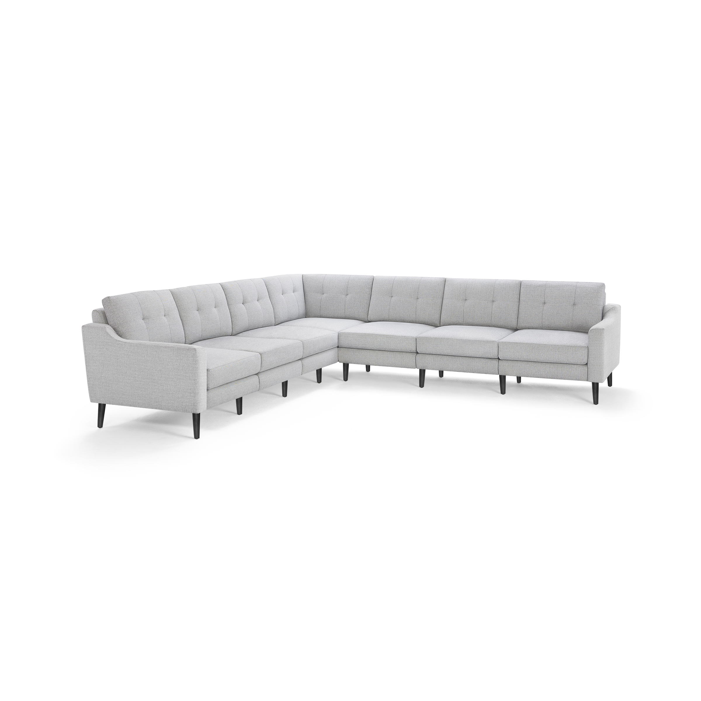 Light gray fabric sectional sofa with tufted back cushions, slim armrests, and black tapered legs, forming an L-shape.