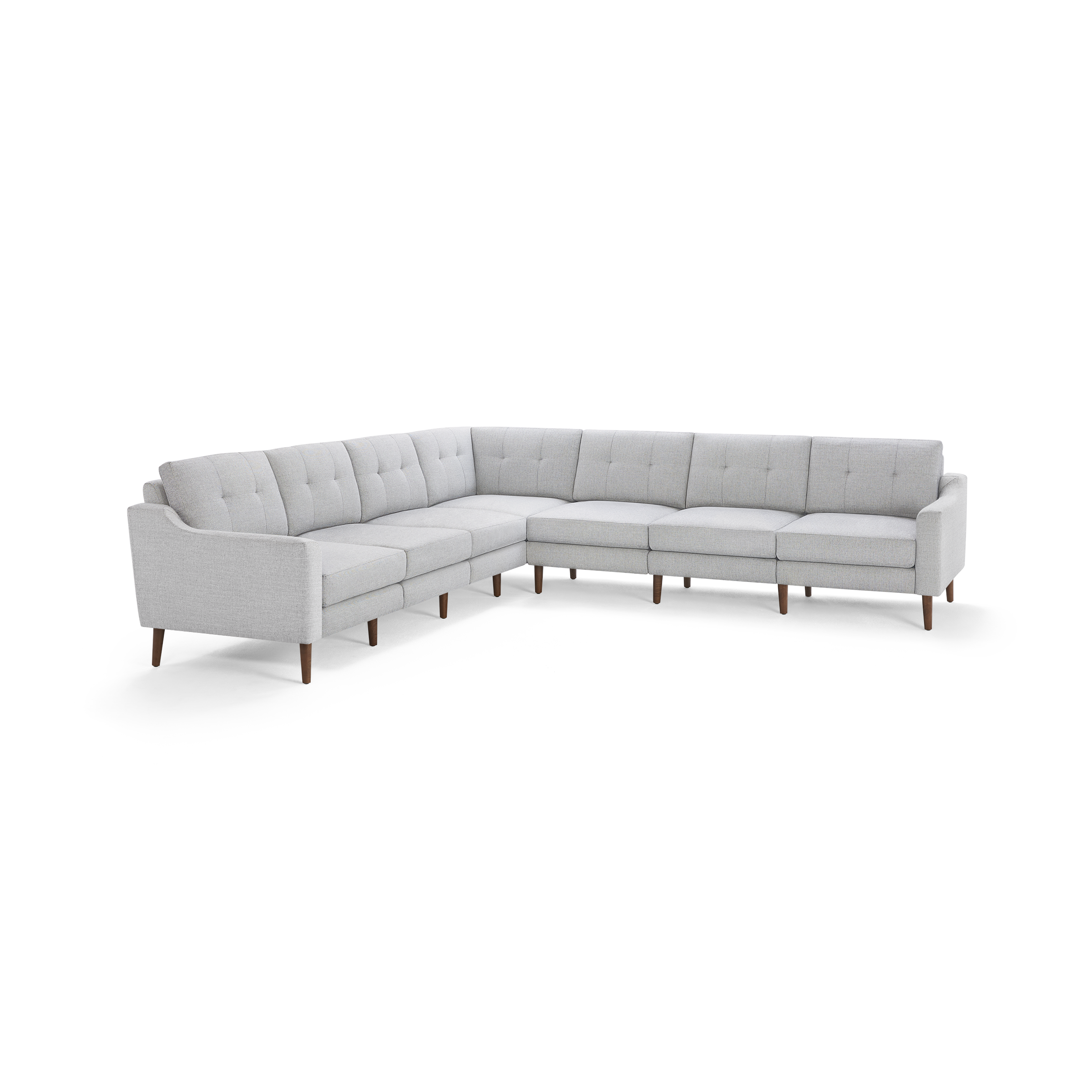 Light gray fabric L-shaped sectional sofa with tufted back cushions and wooden legs, modern mid-century design.