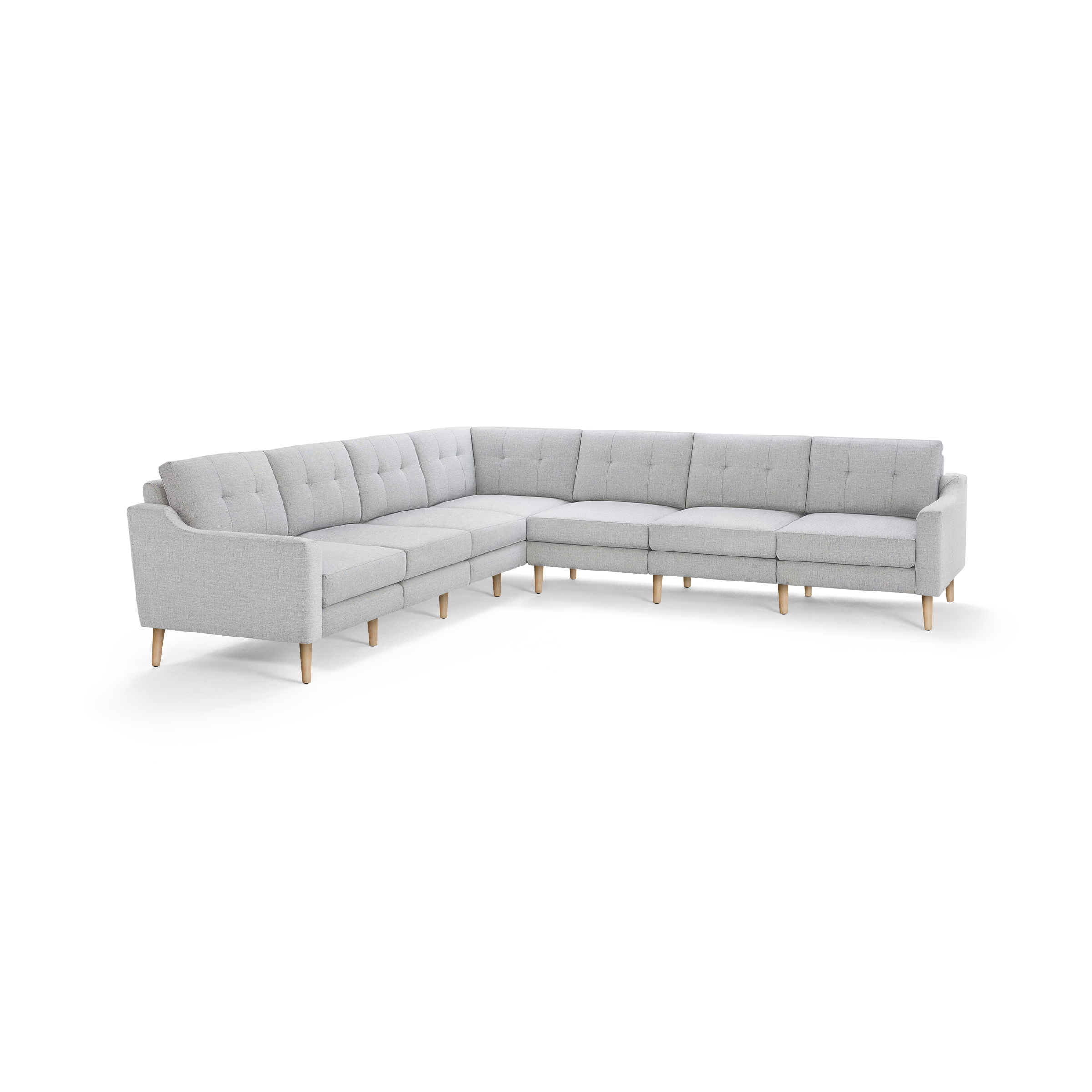 Light gray L-shaped sectional sofa with tufted back cushions and wooden legs, modern and minimalist design.