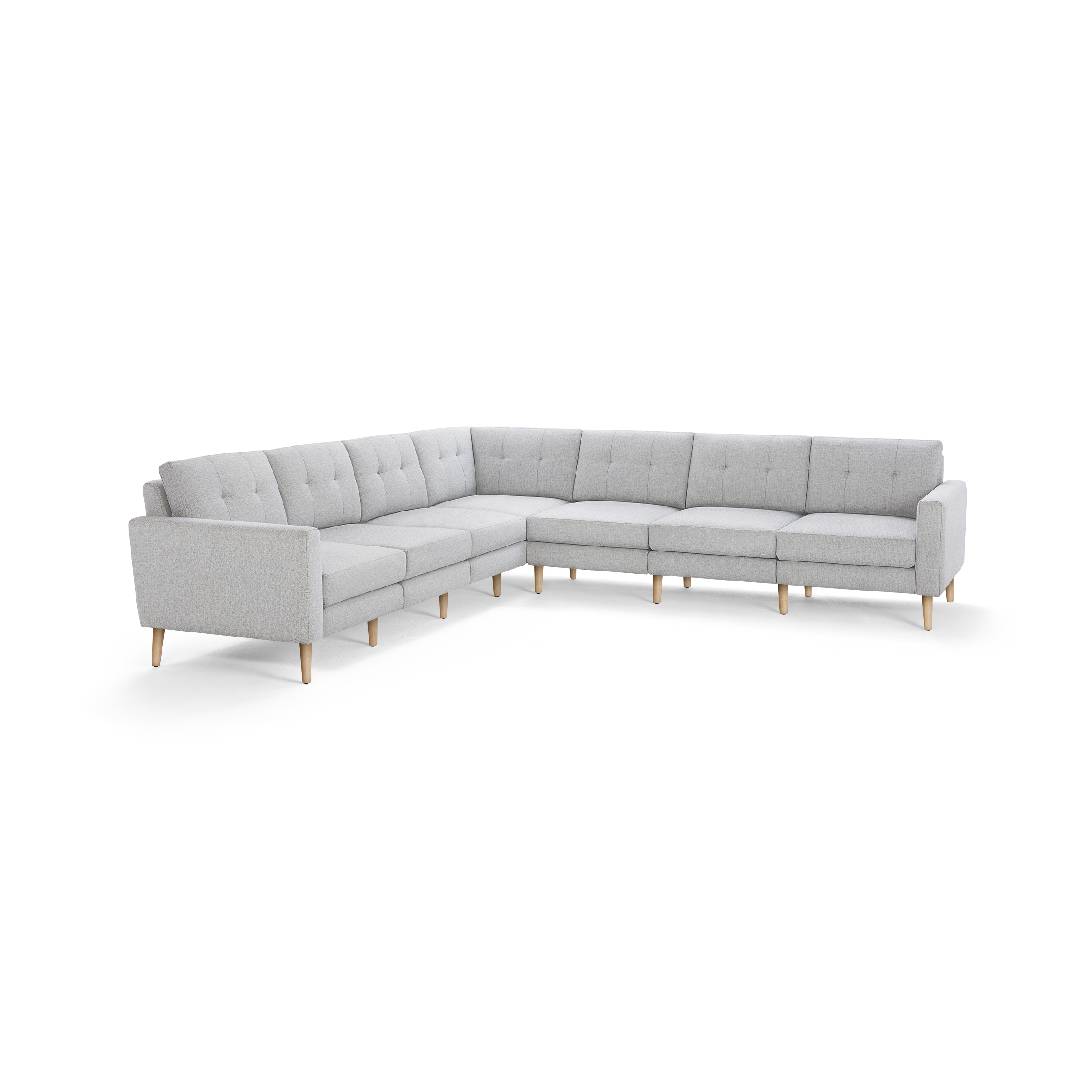 Light gray L-shaped sectional sofa with tufted cushions and wooden legs, featuring clean lines and modern design.