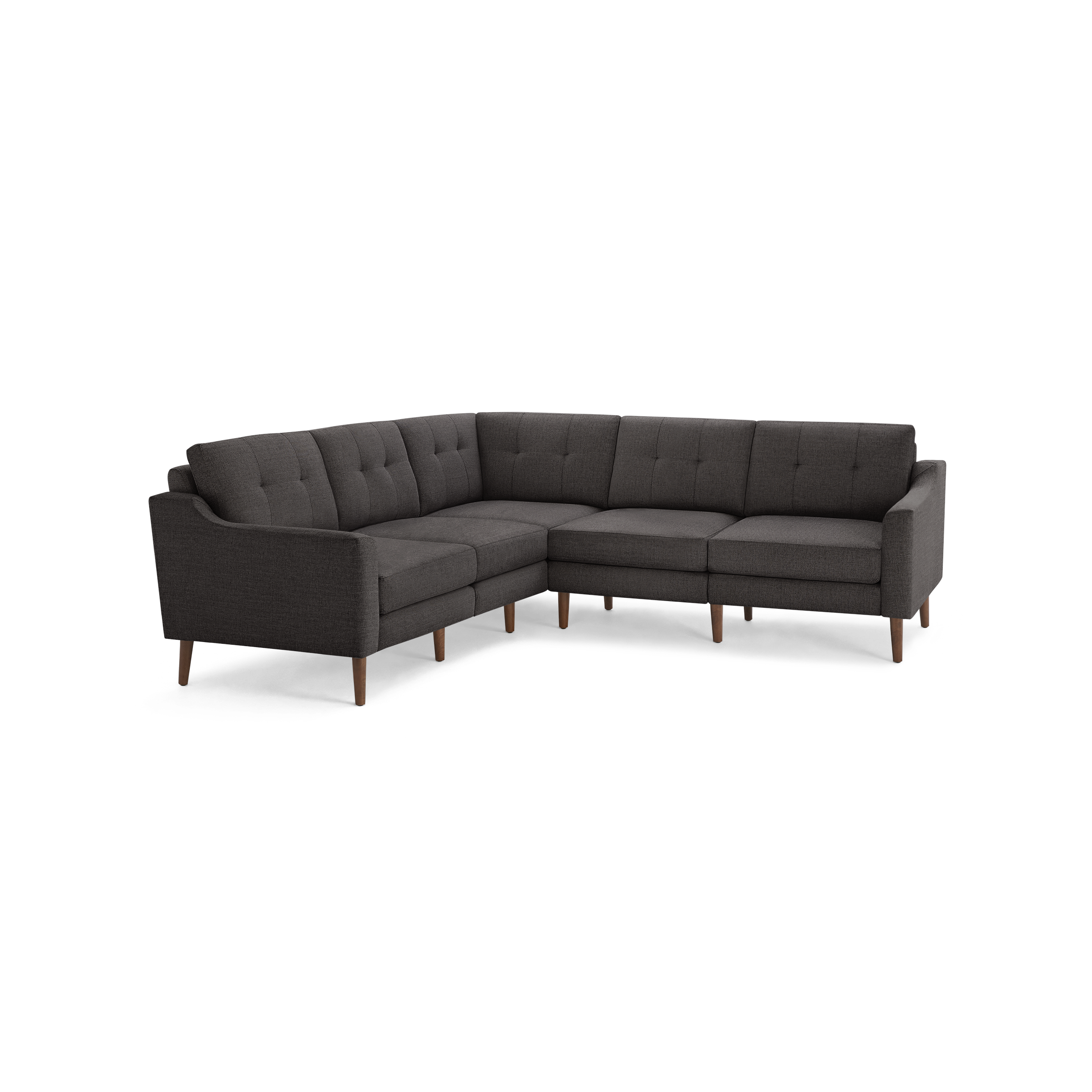 Dark gray fabric L-shaped sectional sofa with tufted back cushions and wooden legs, modern mid-century design.