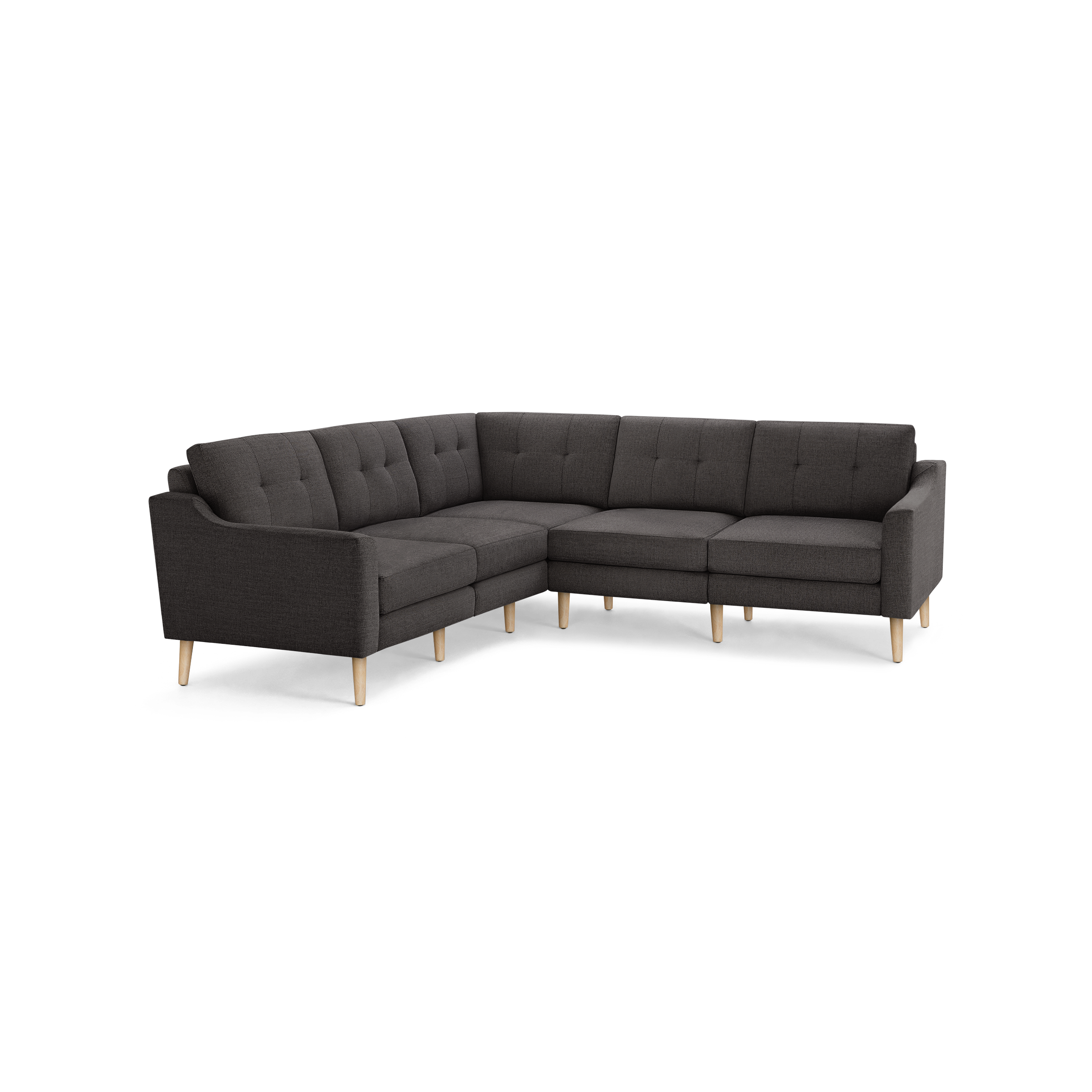 L-shaped dark gray fabric sectional sofa with tufted back cushions and light wooden tapered legs.